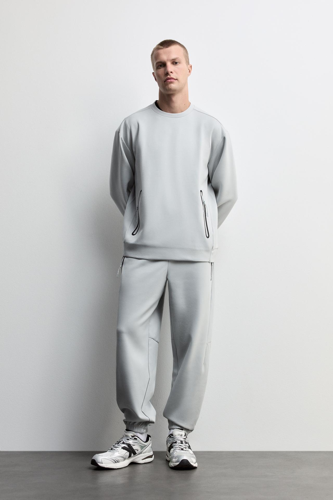 Wide-leg interlock trousers — GREY MARL