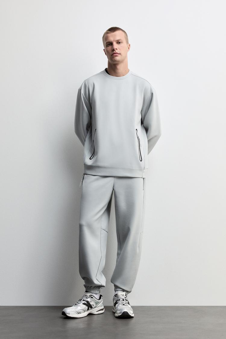 Wide-leg interlock trousers — GREY MARL