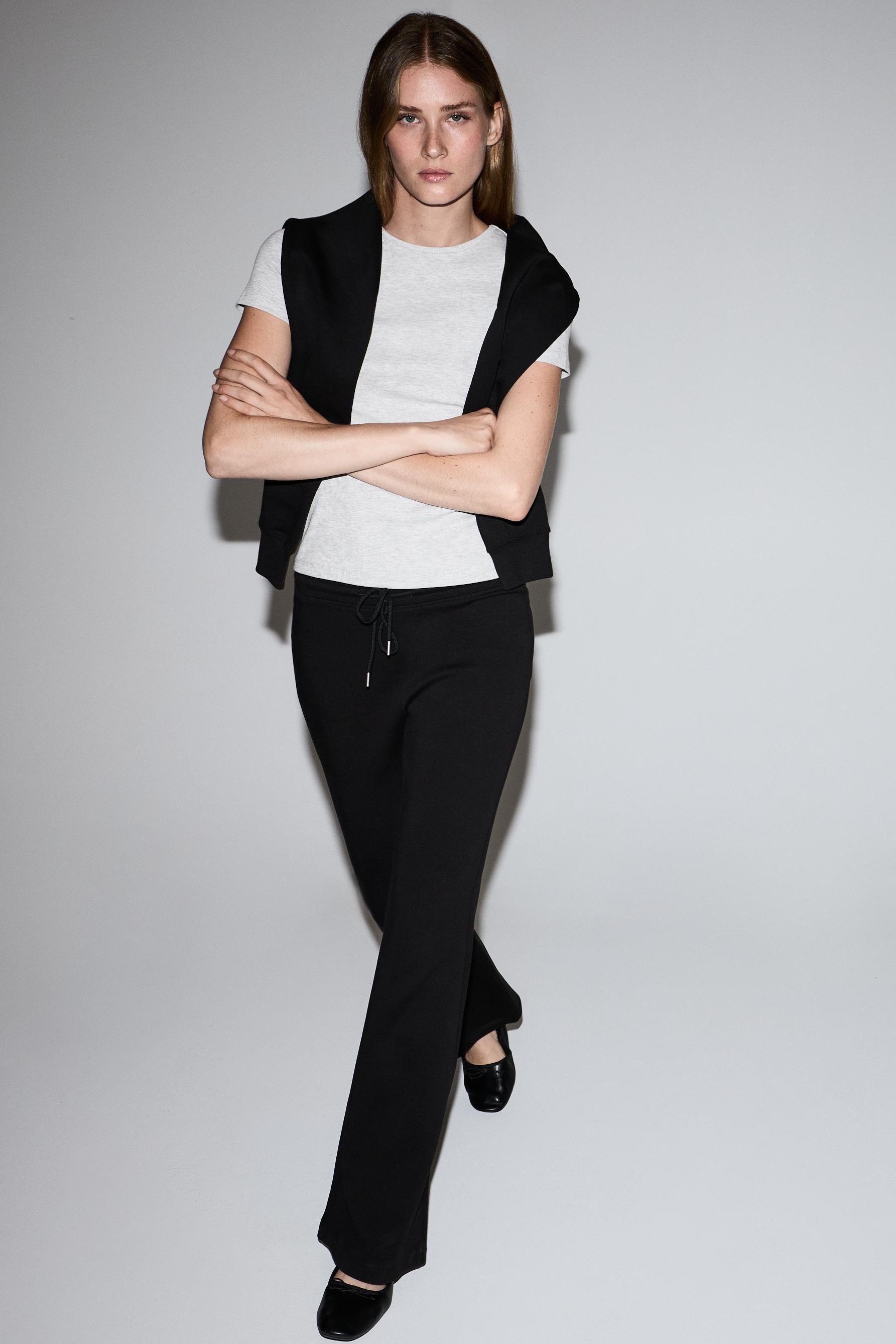 Basic interlock bell bottom trousers — BLACK