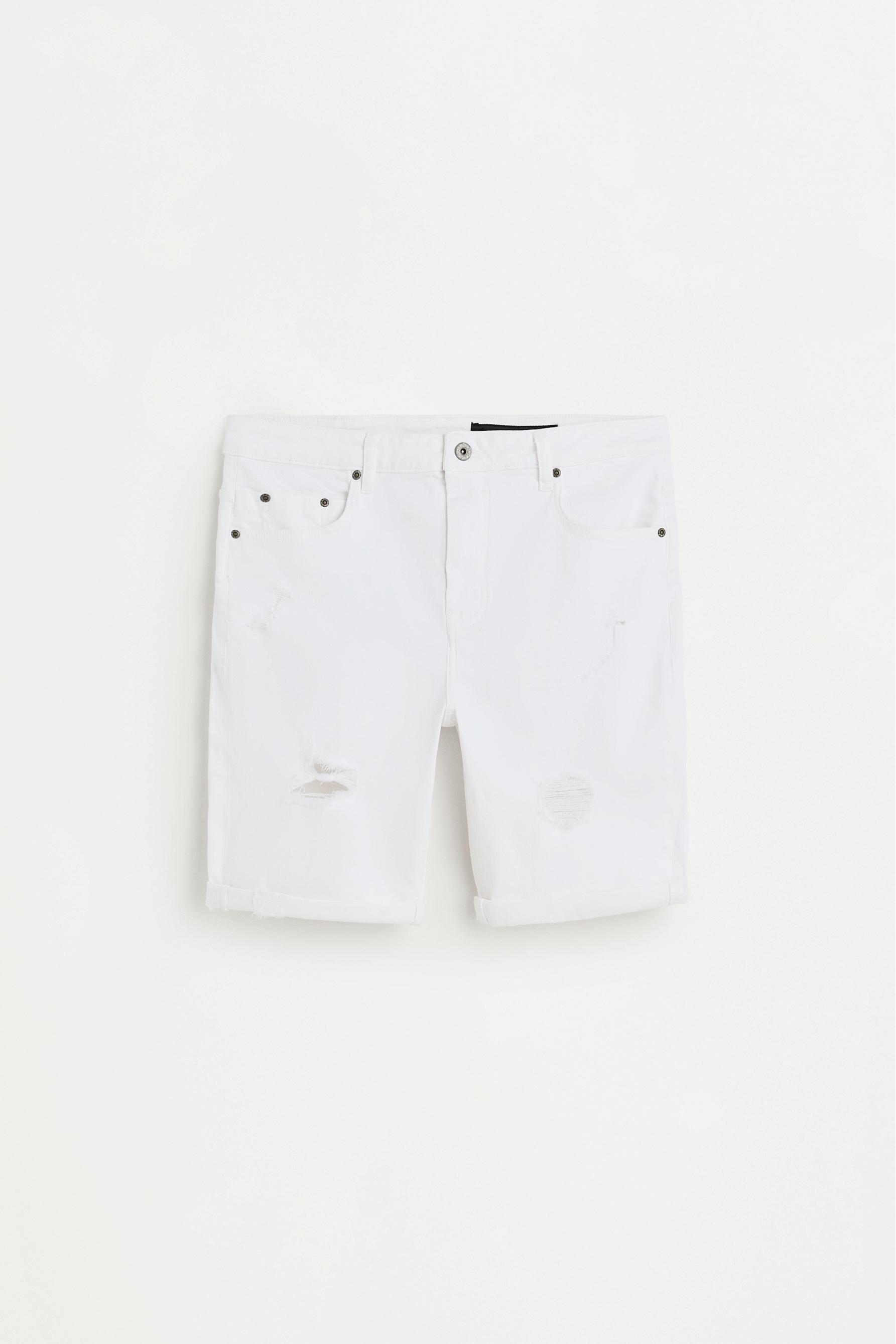 Distressed skinny denim Bermuda shorts — WHITE