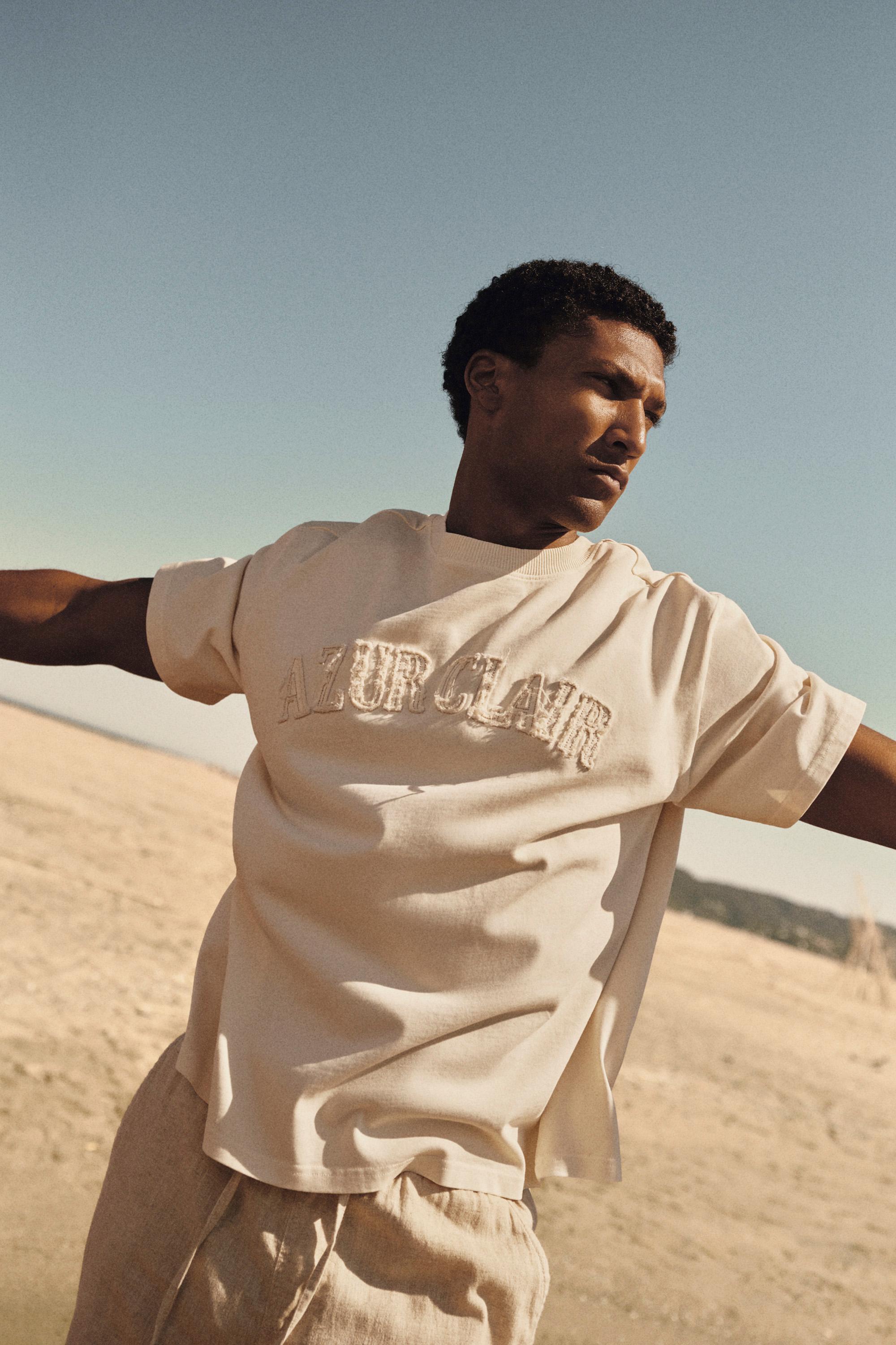 Slogan patch T-shirt — BUTTER
