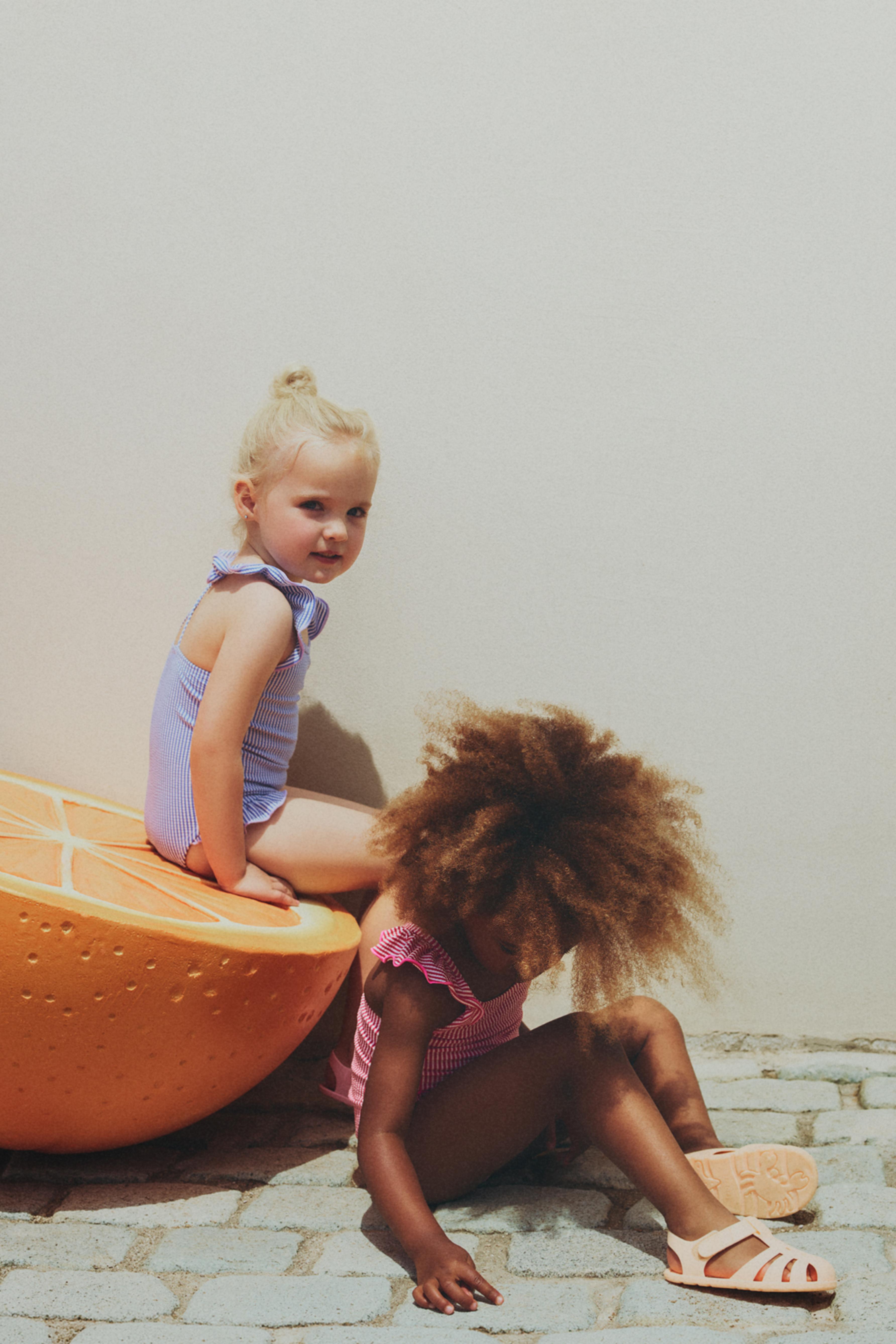 Striped ruffled swimsuit — FUCHSIA