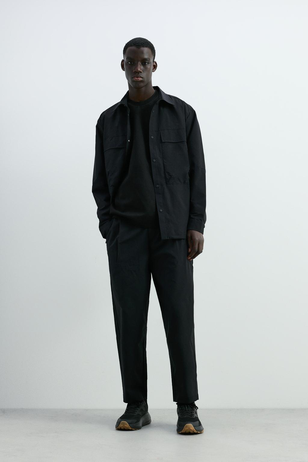 Sports tailored fit trousers with pleats and ring detail