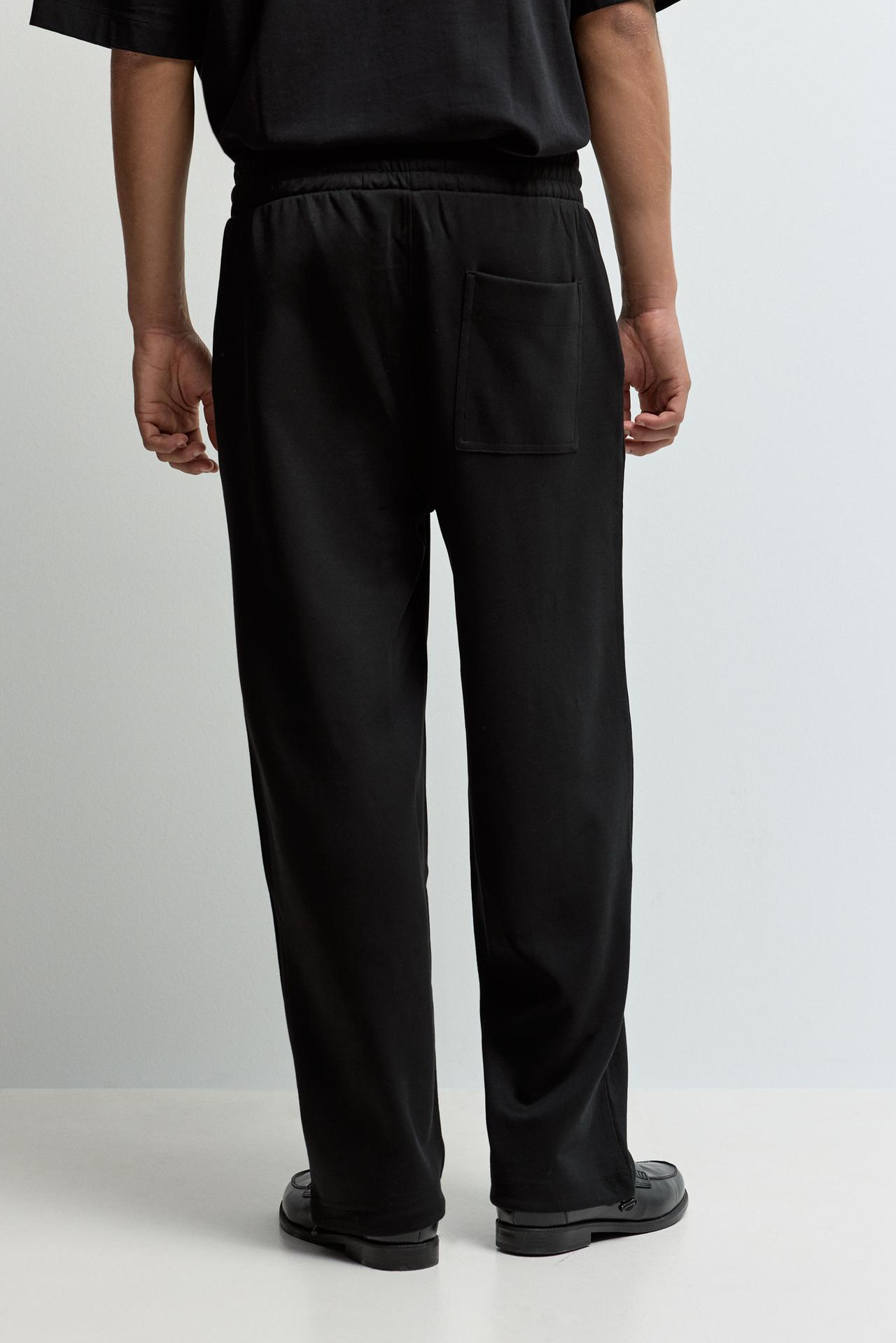 Interlock baggy trousers — BLACK