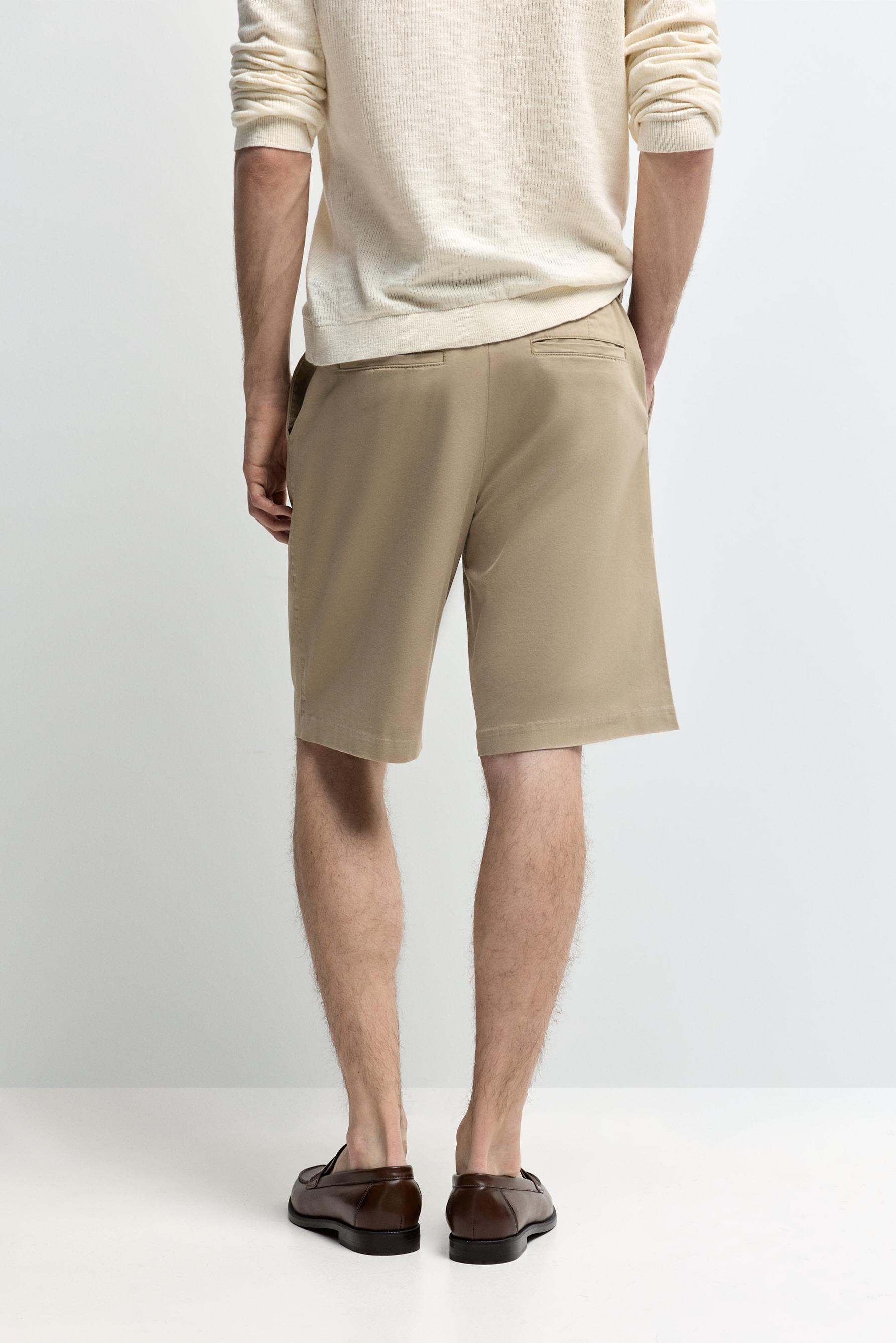 Pleated chino Bermuda shorts — SAND