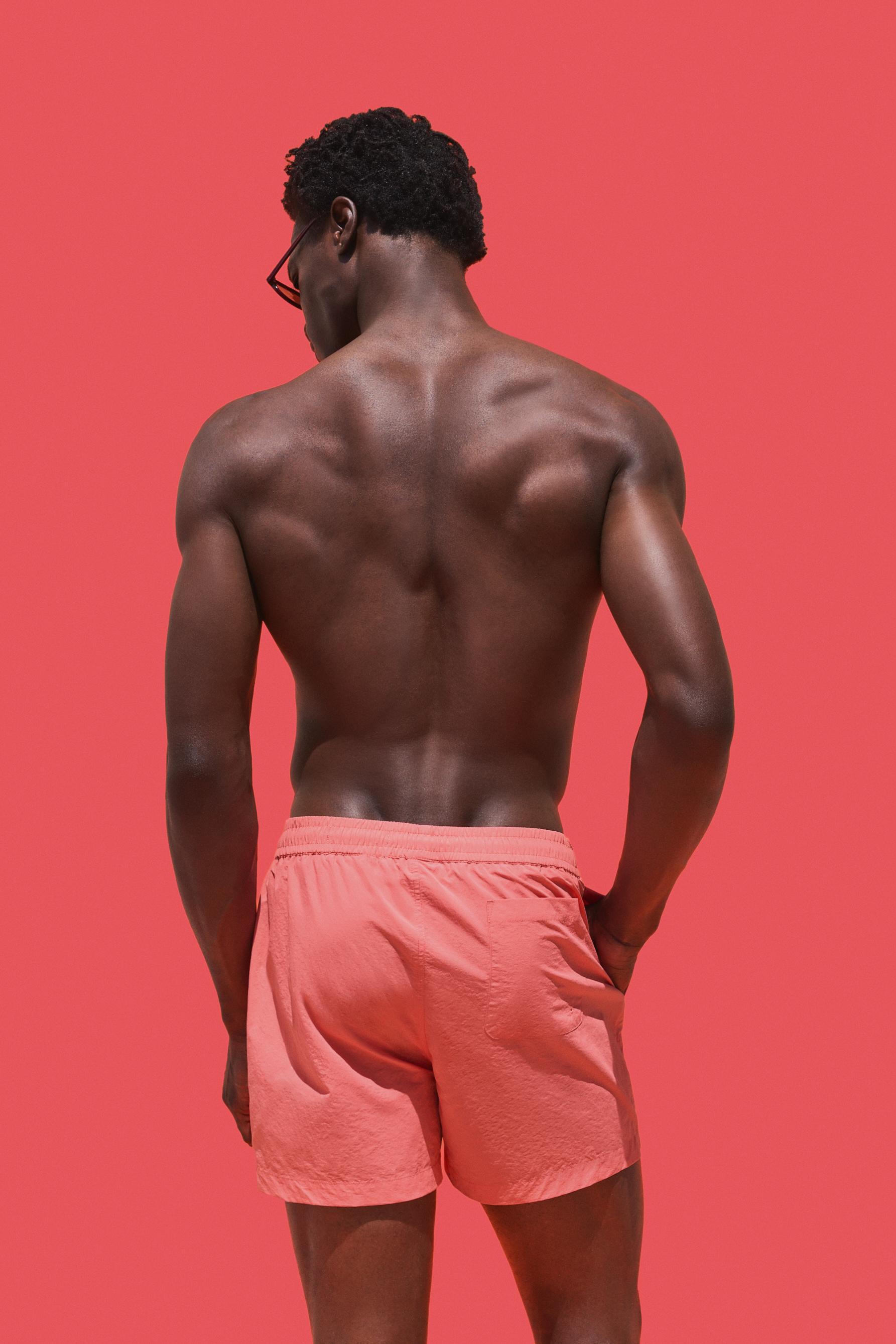 Coloro x Lefties straight swim trunks — CORAL RED