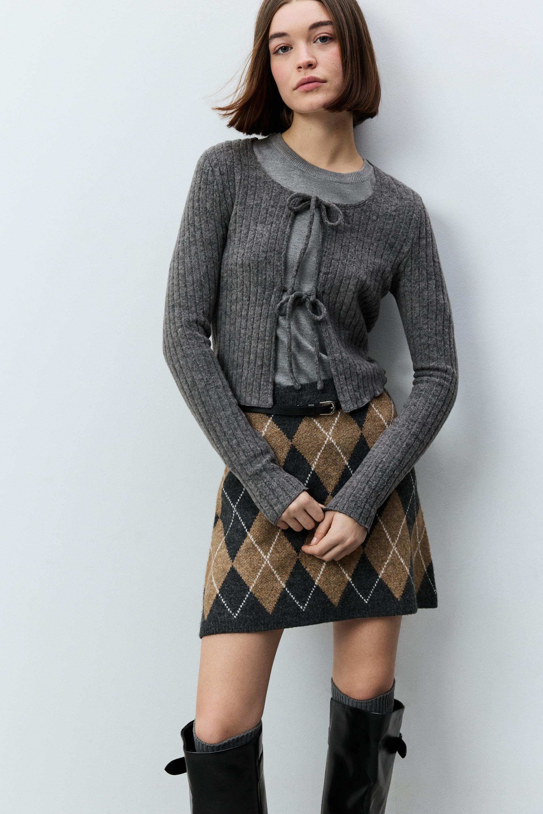 Chaqueta lazadas punto cortado