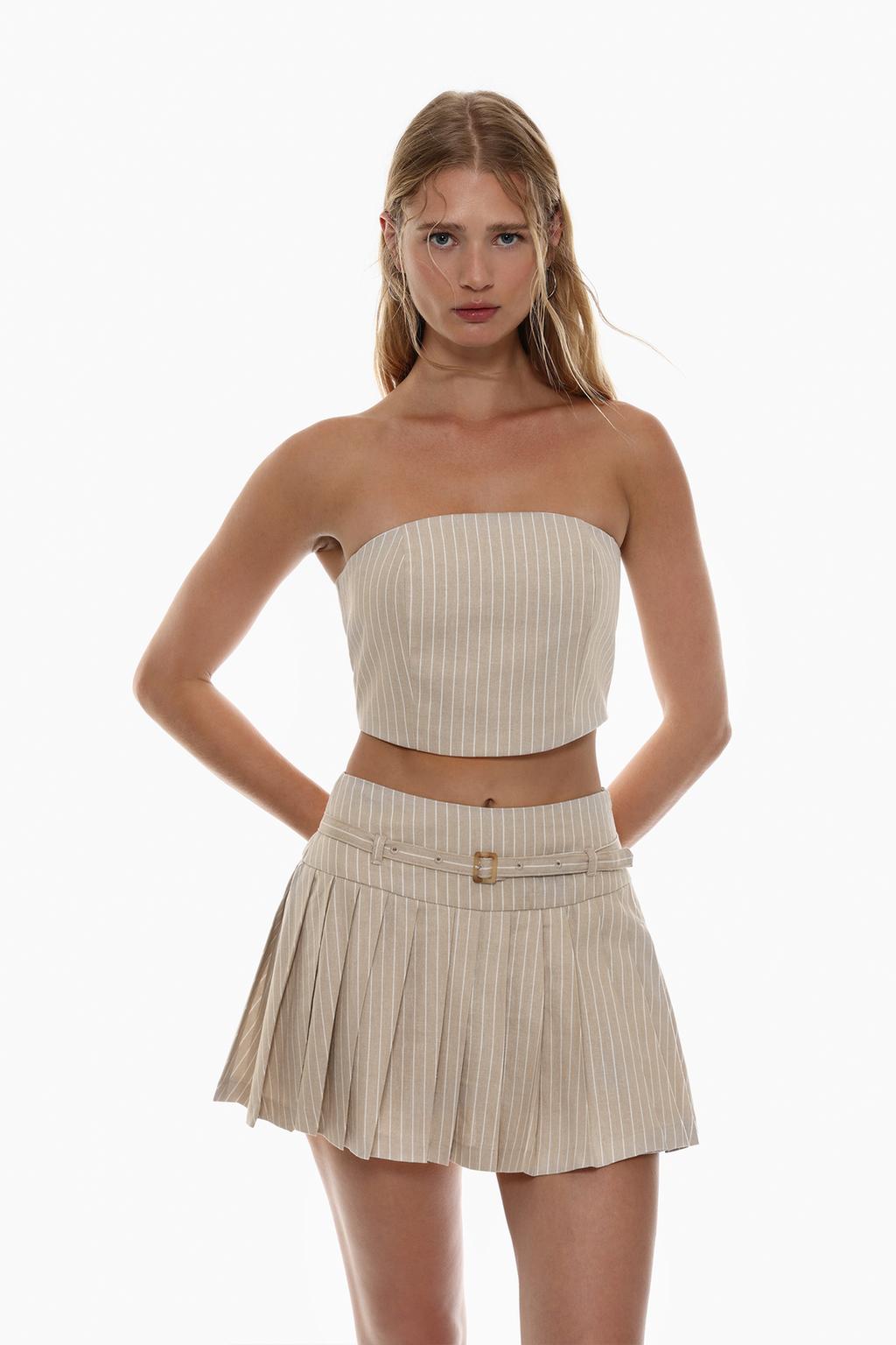 Pleated skirt-effect trousers