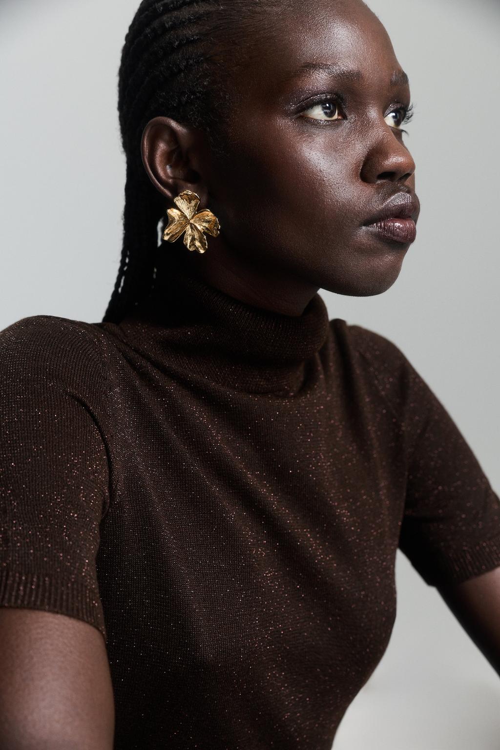 Metallic roll neck sweater