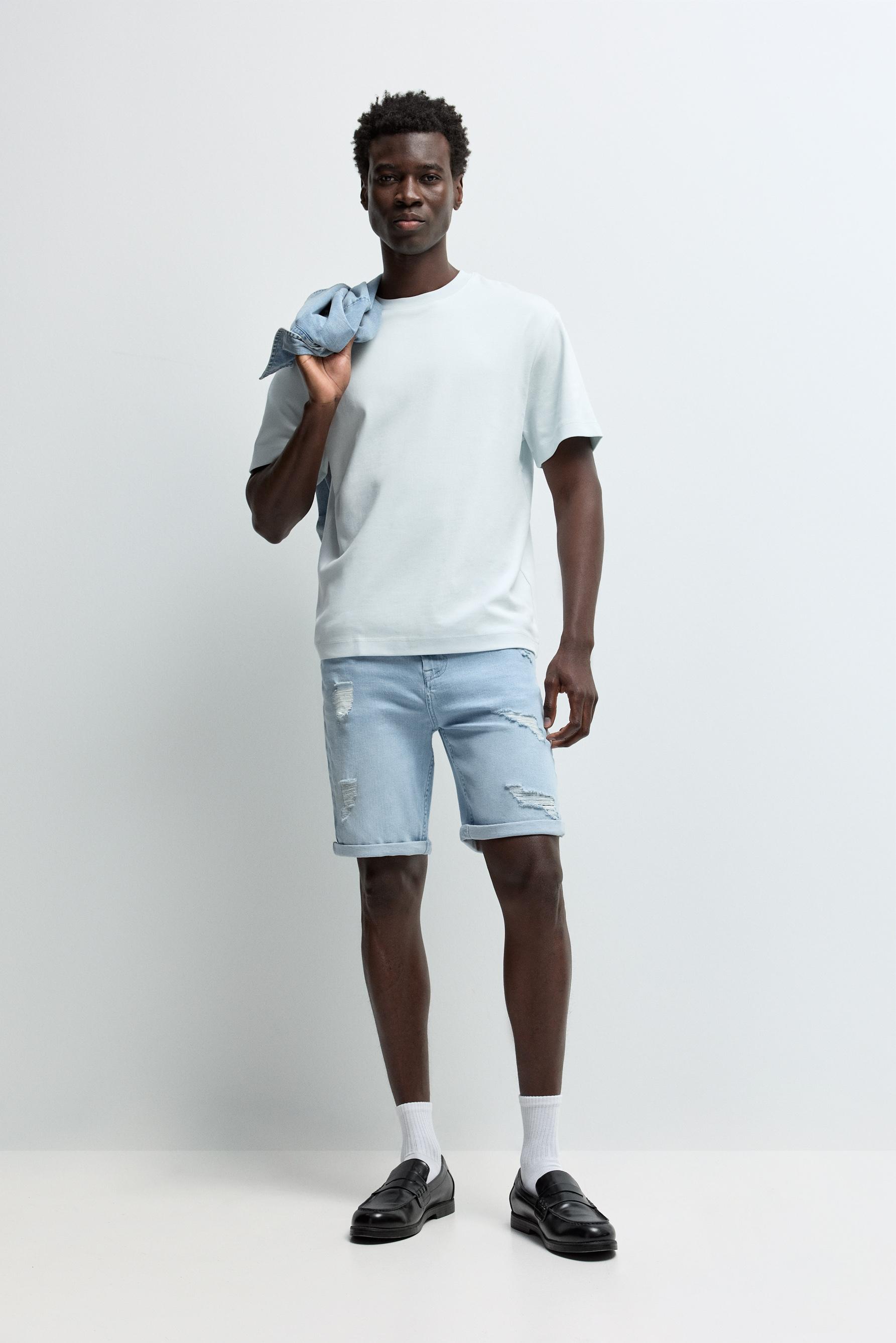 Distressed skinny denim Bermuda shorts — PALE BLUE