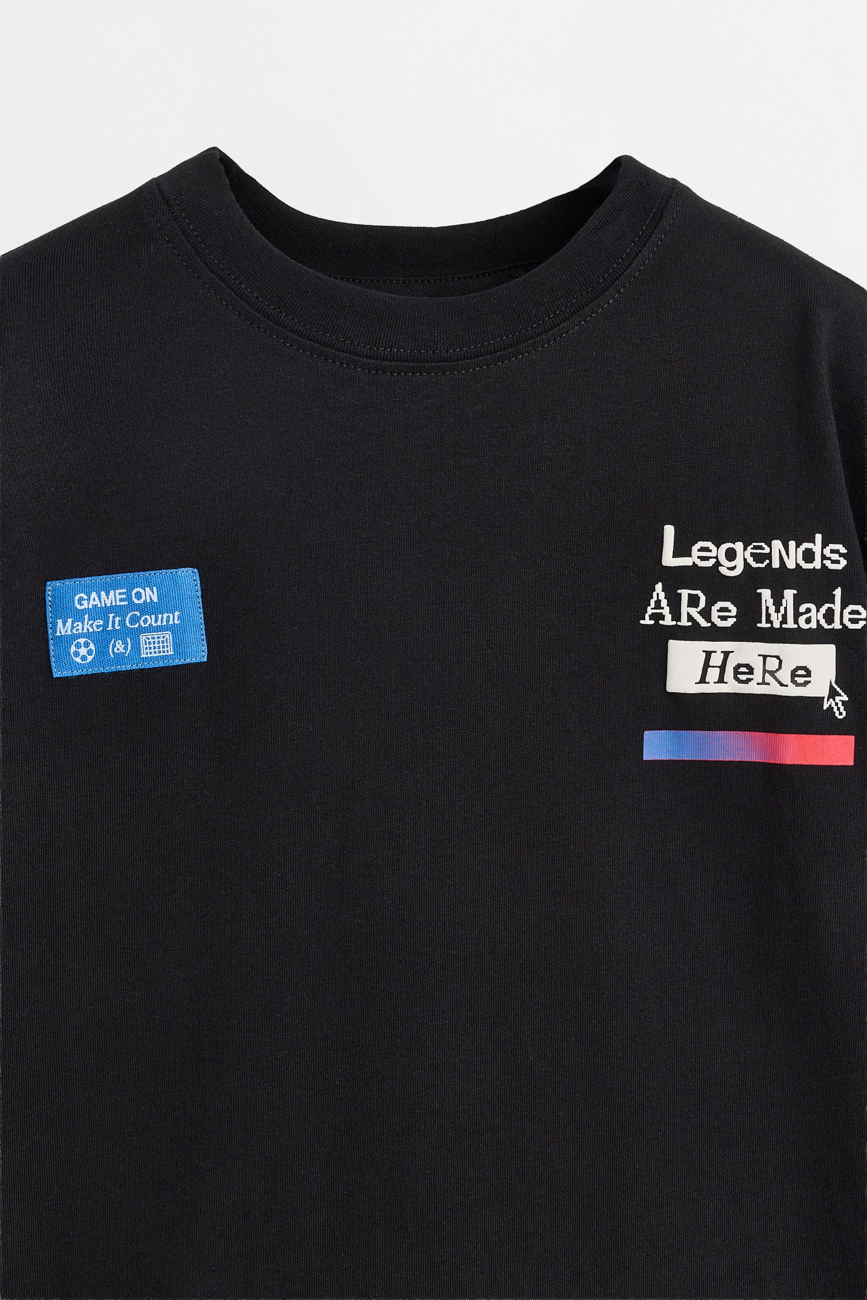 T-shirt with a maxi print on the back — BLACK