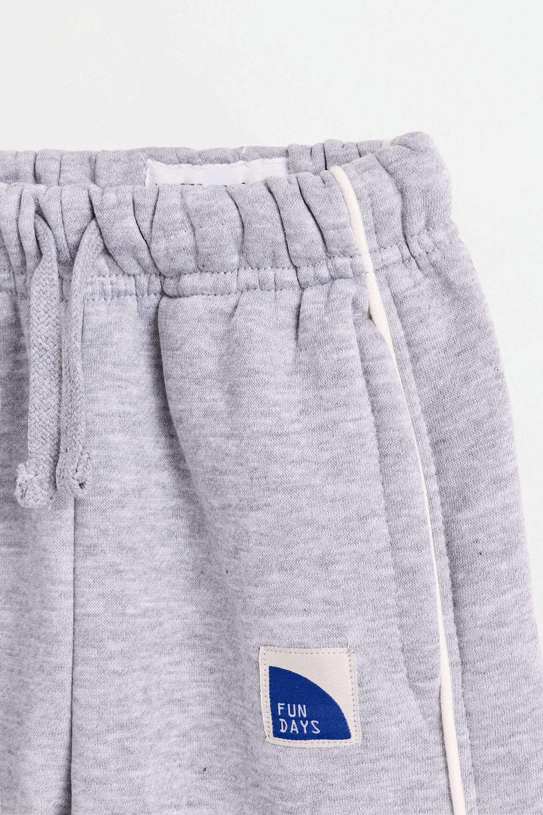 Plush trousers with piping — GREY MARL
