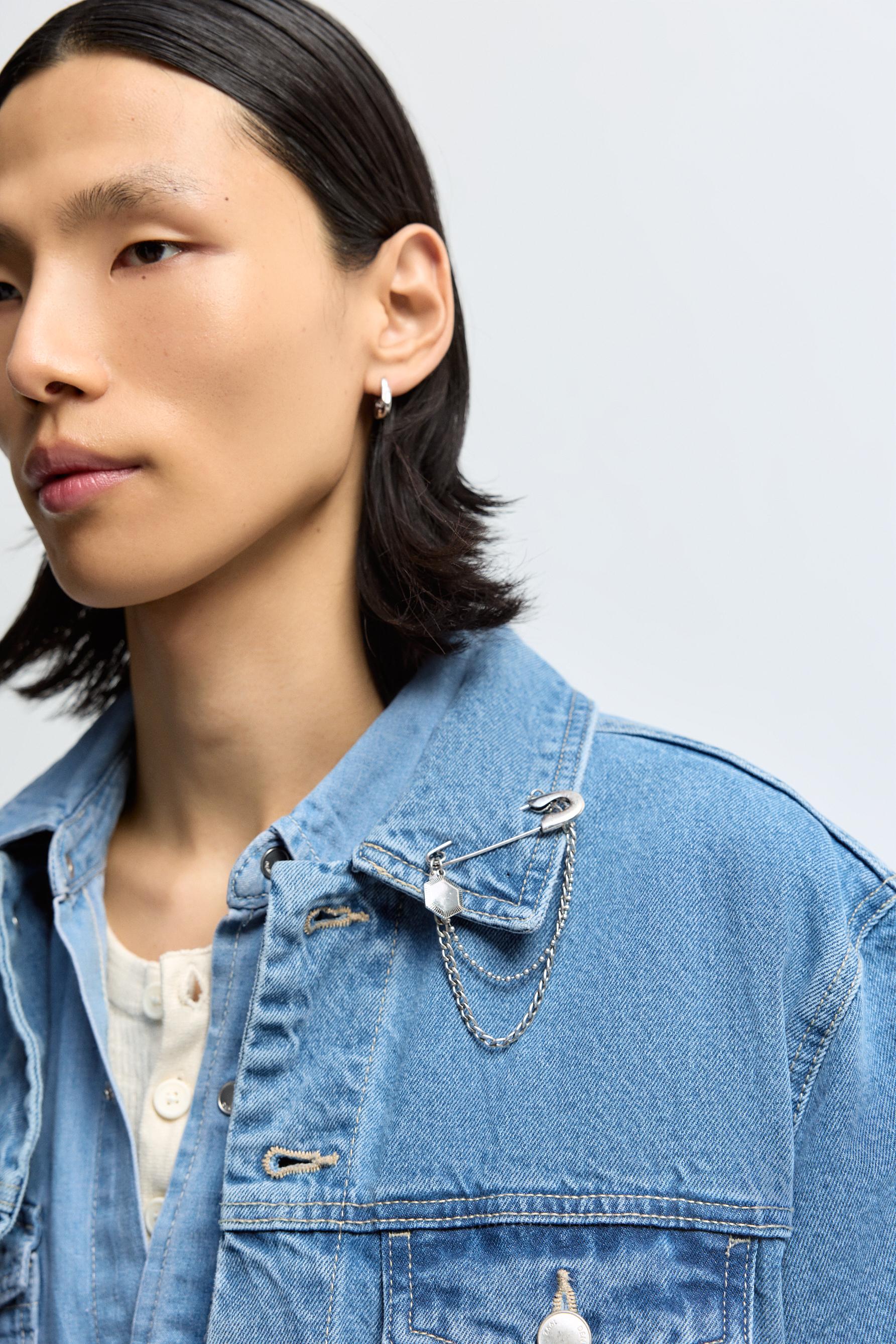 Broche imperdible con cadena