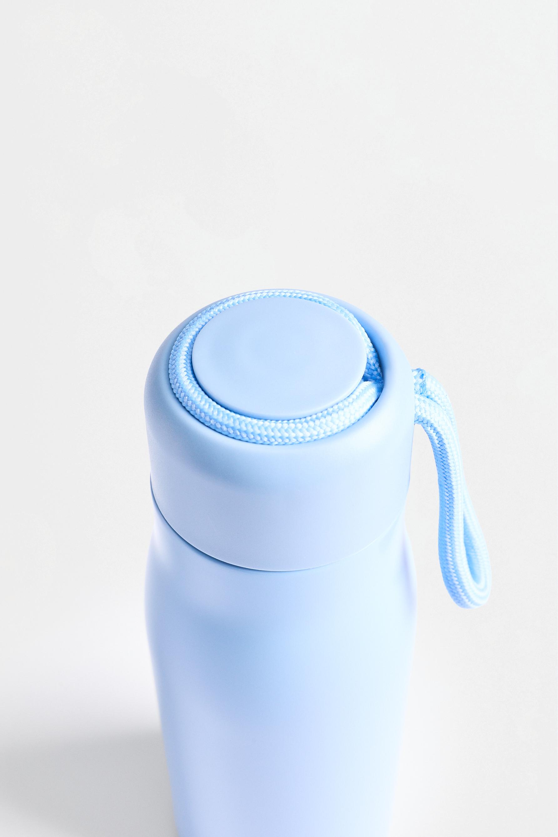 Metallic travel bottle — PALE BLUE