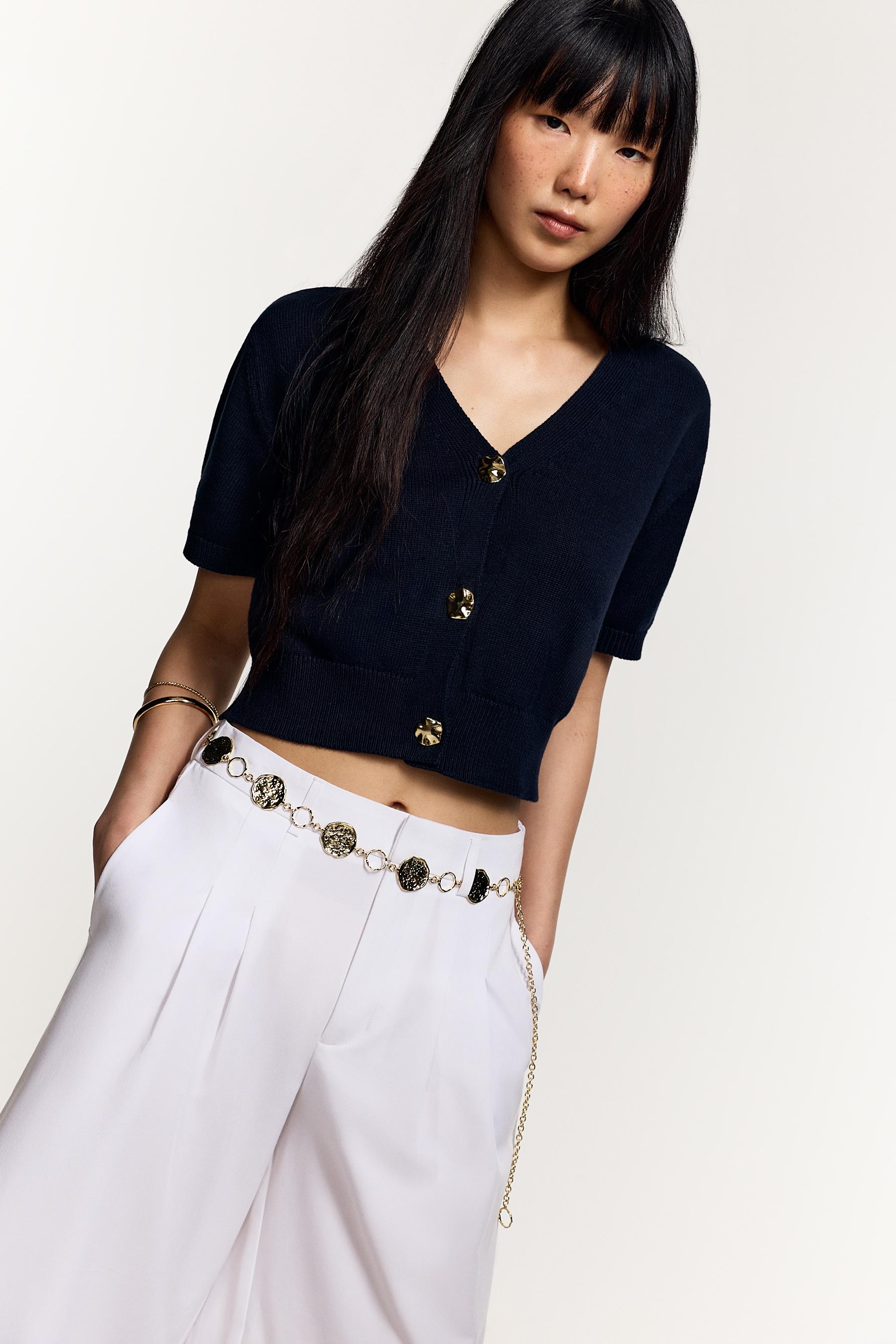 Chaqueta manga corta botones dorados