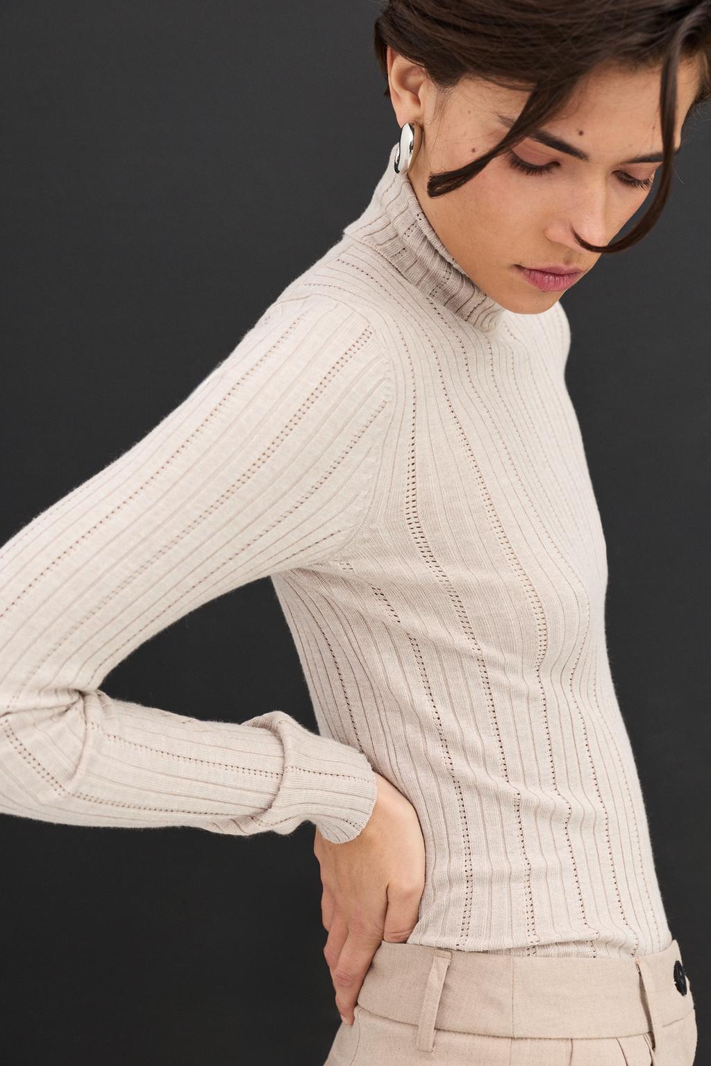 Ribbed roll neck sweater