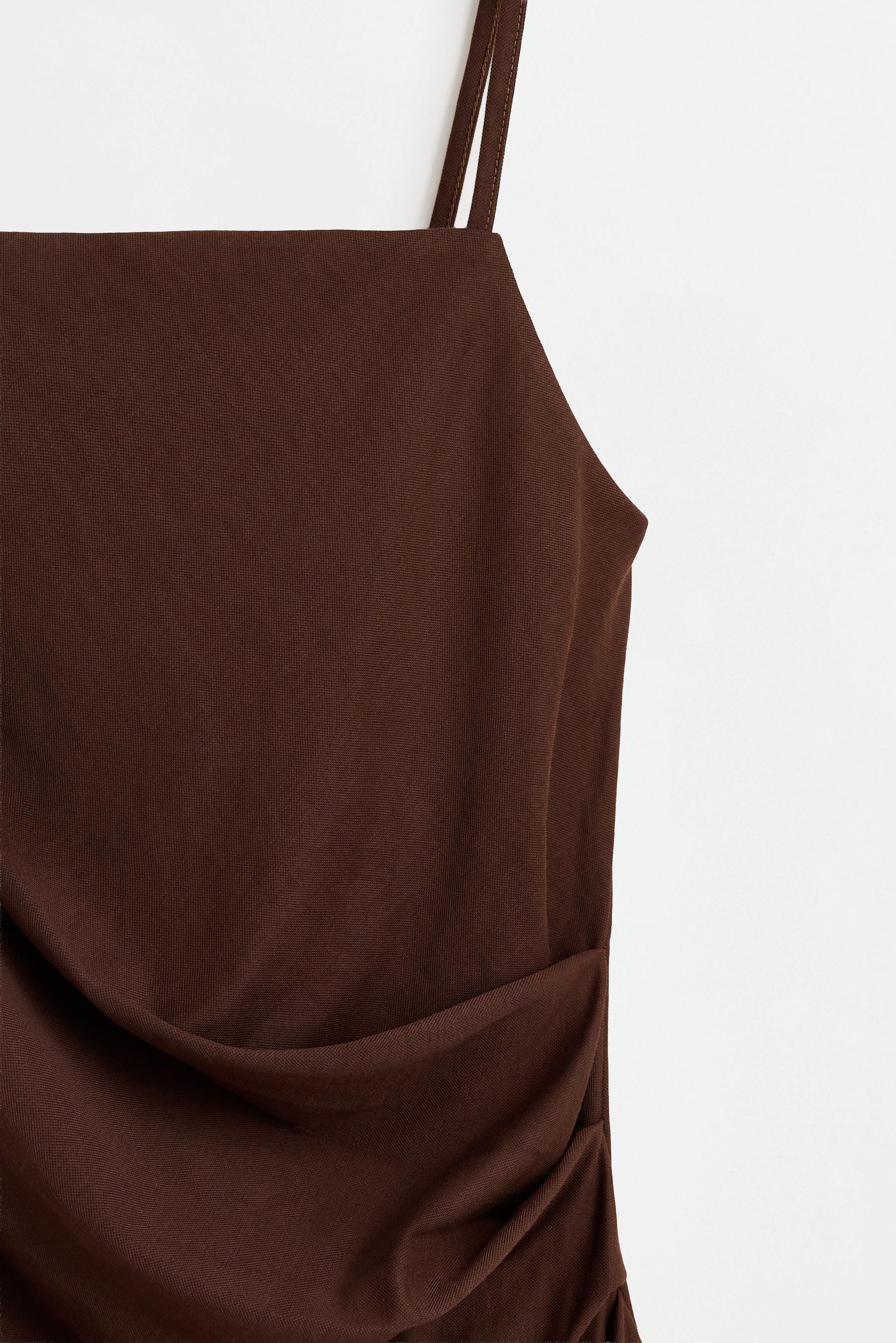 Flowing asymmetric top — CHOCOLATE