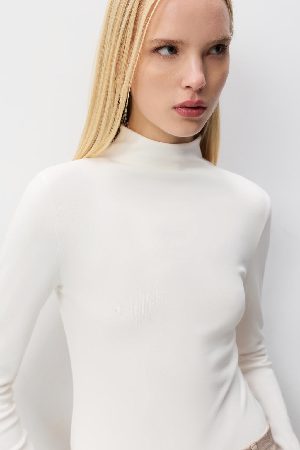 Body manga larga cuello subido