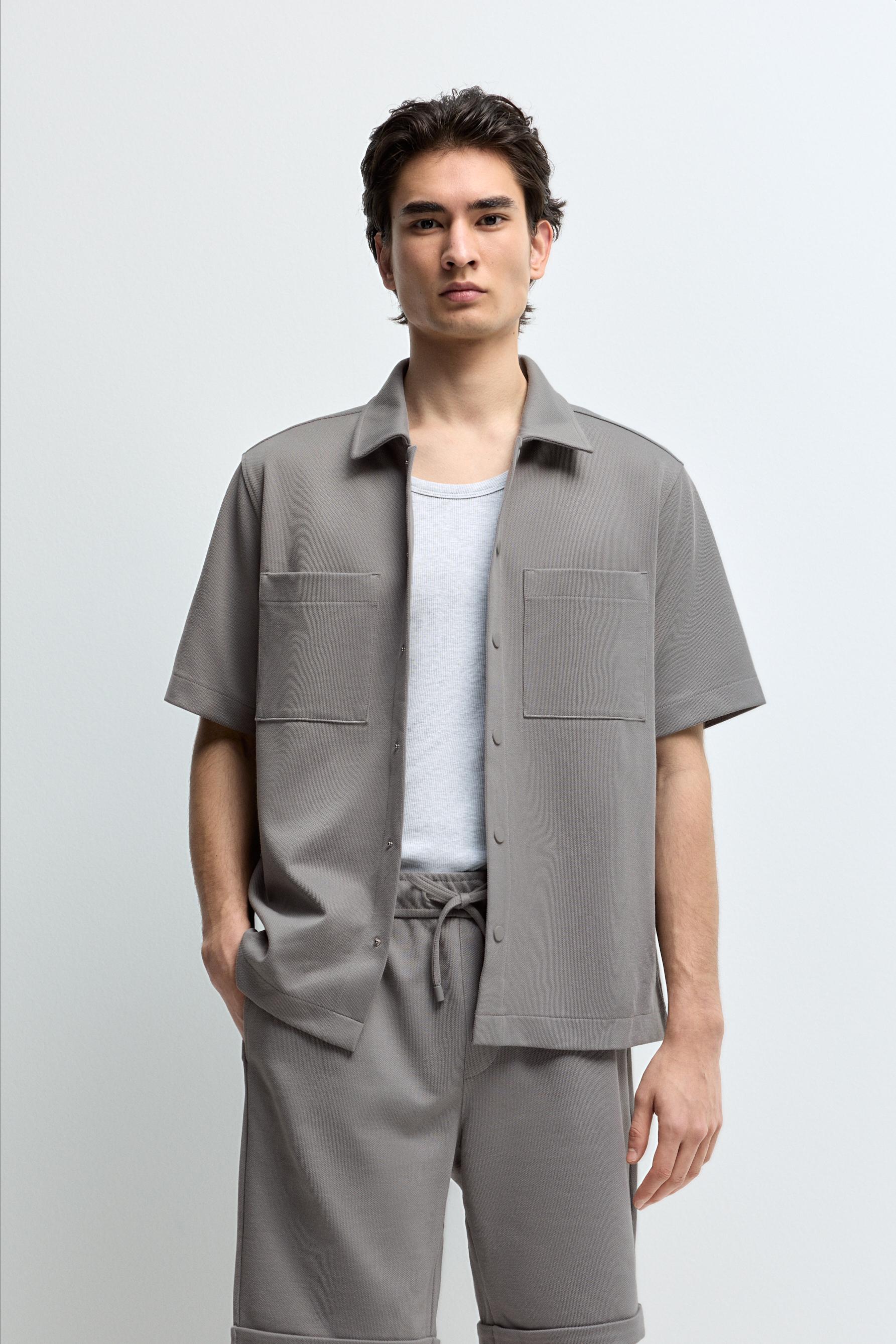 Camisa piqué bolsillos