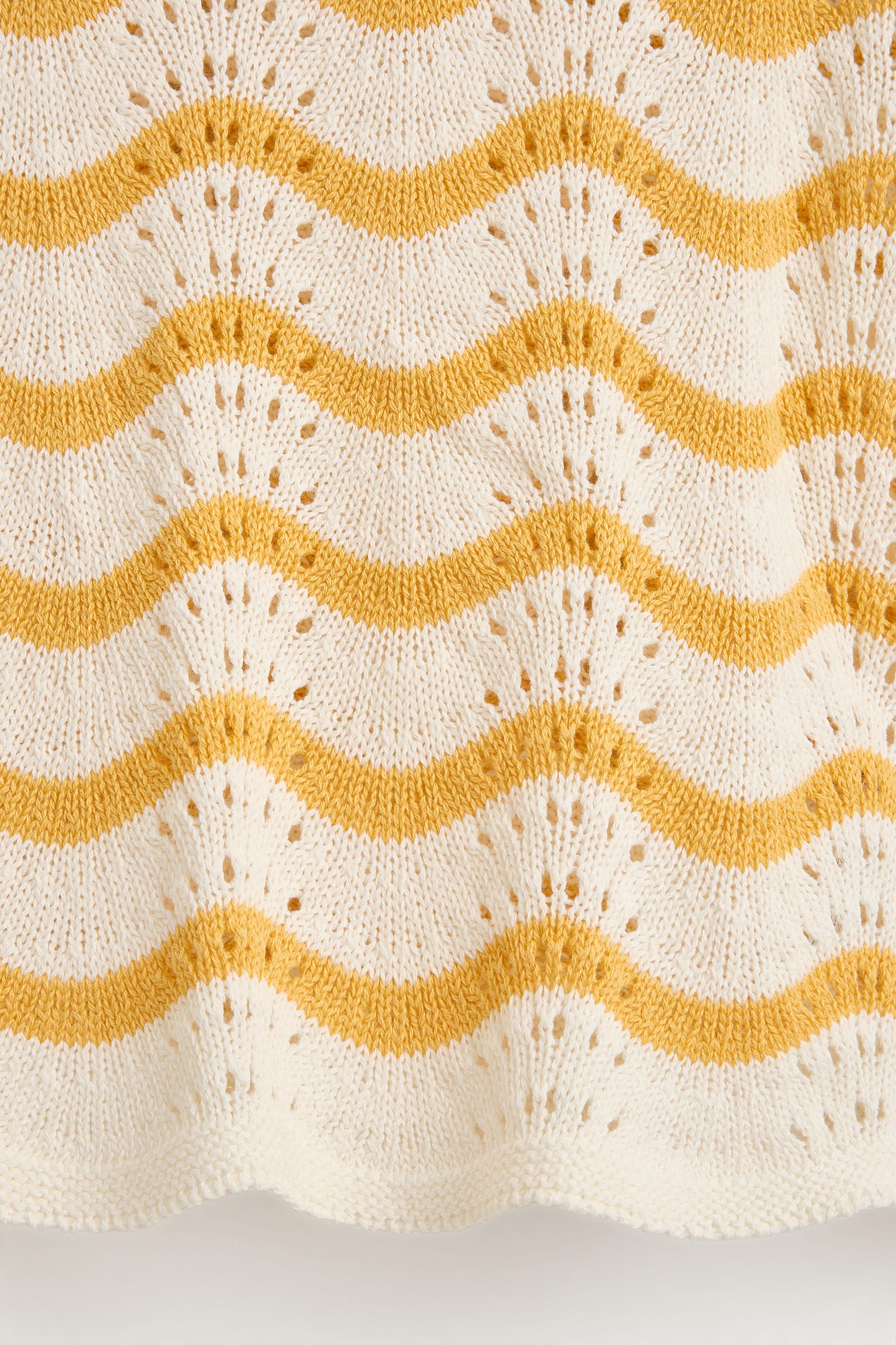 Wavy cutwork knit top — MUSTARD