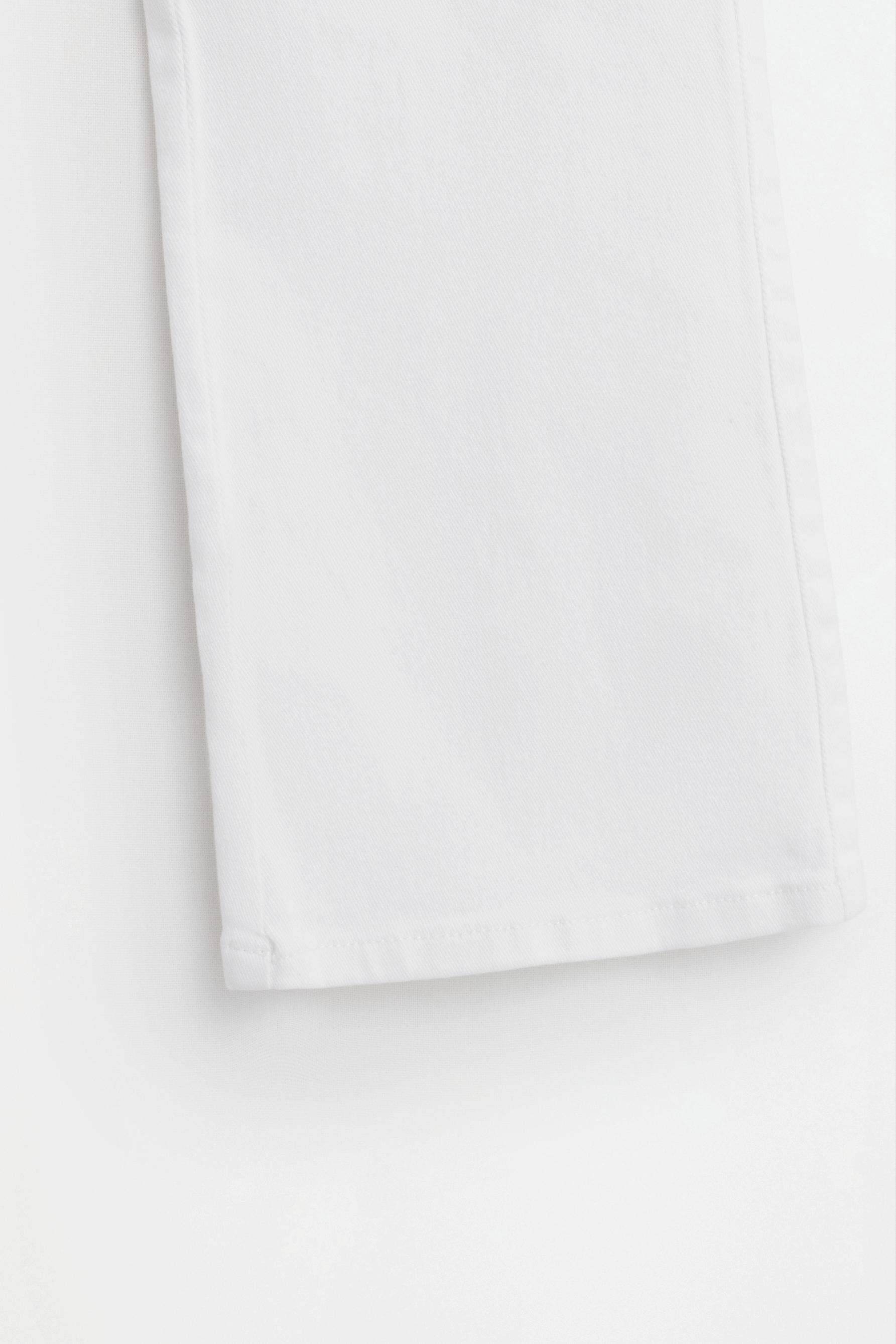 Twill bell bottom trousers — IVORY