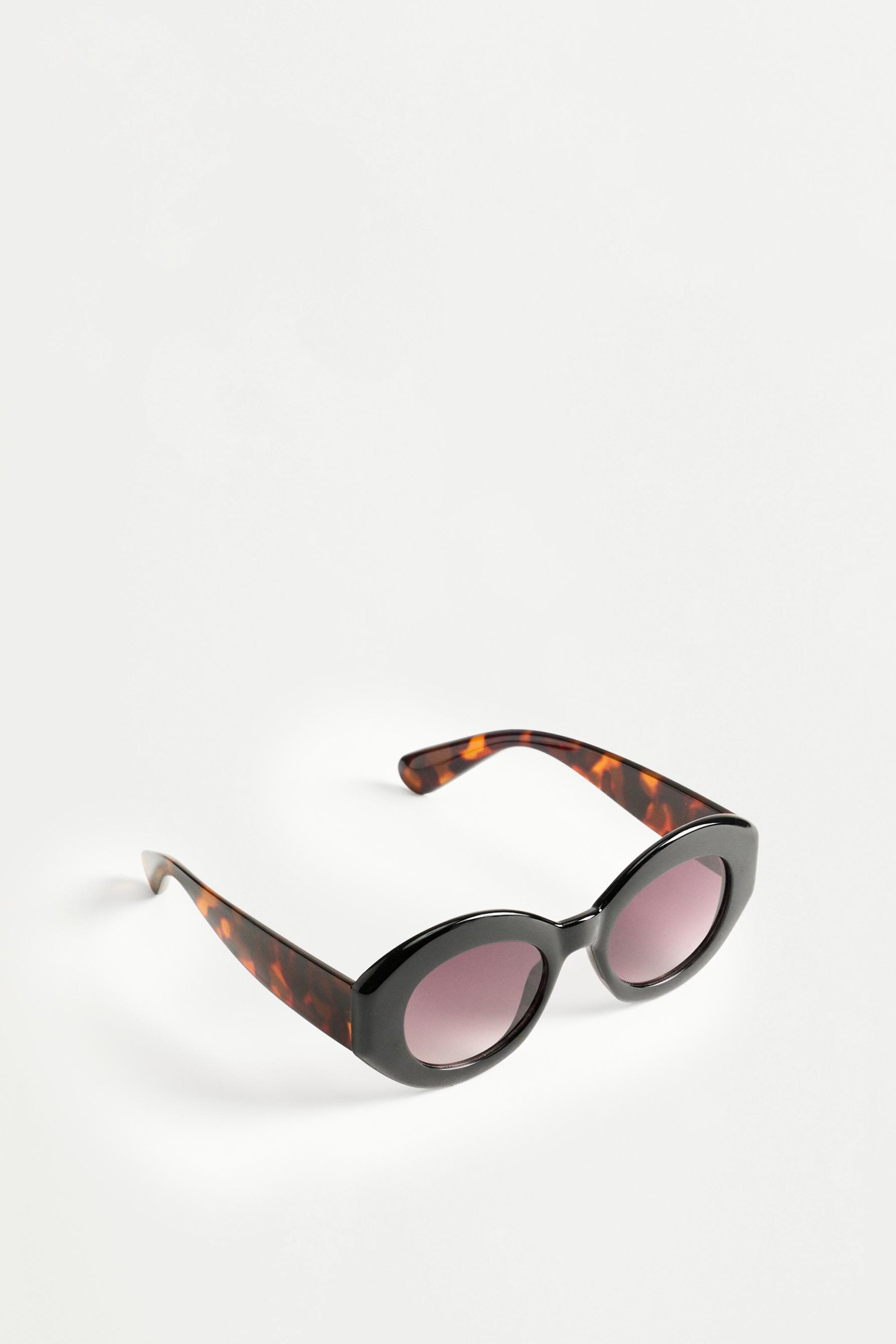 Dark tortoiseshell round sunglasses — BLACK