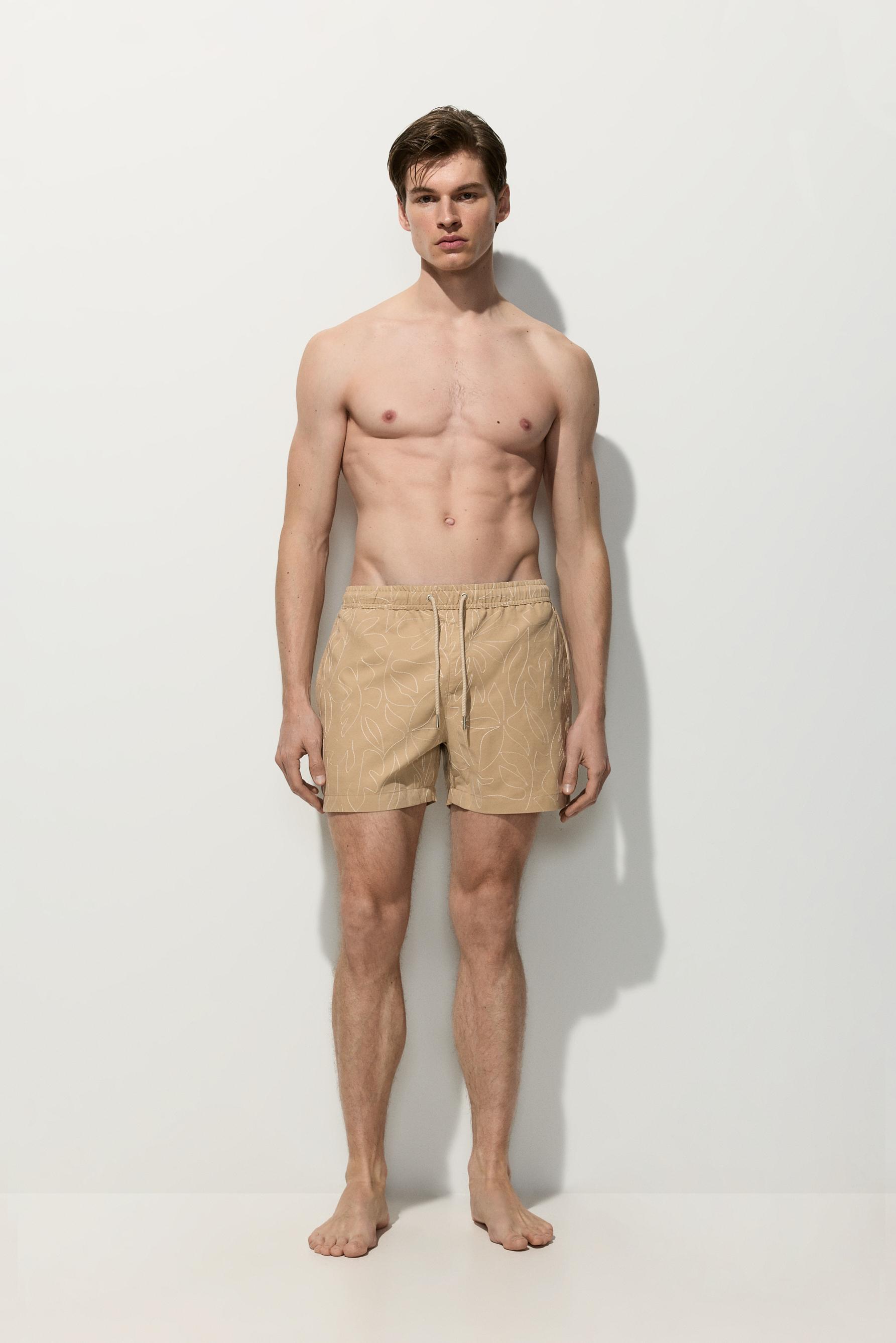 Embroidered regular swim shorts — BEIGE