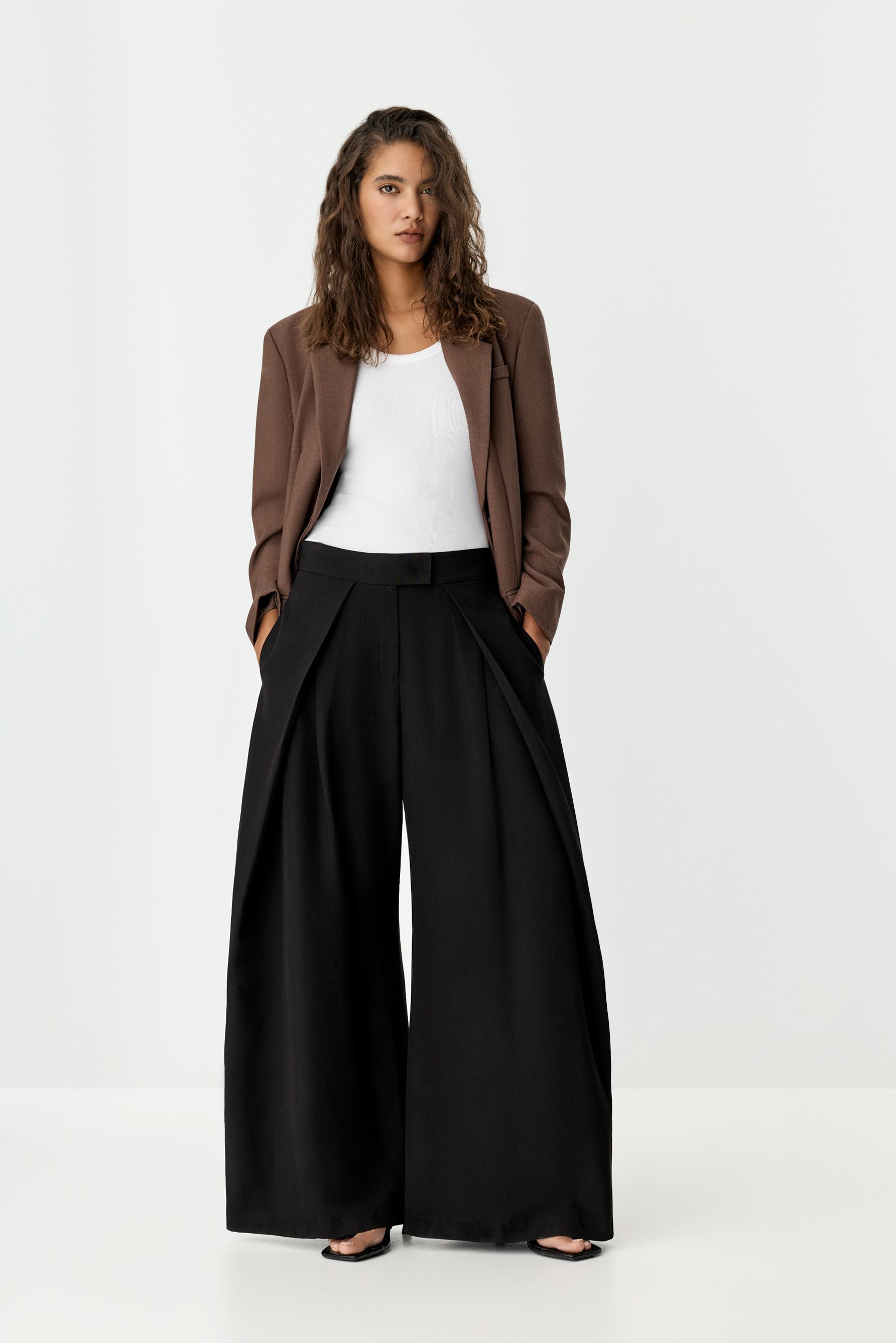Pantalón wide leg pliegues
