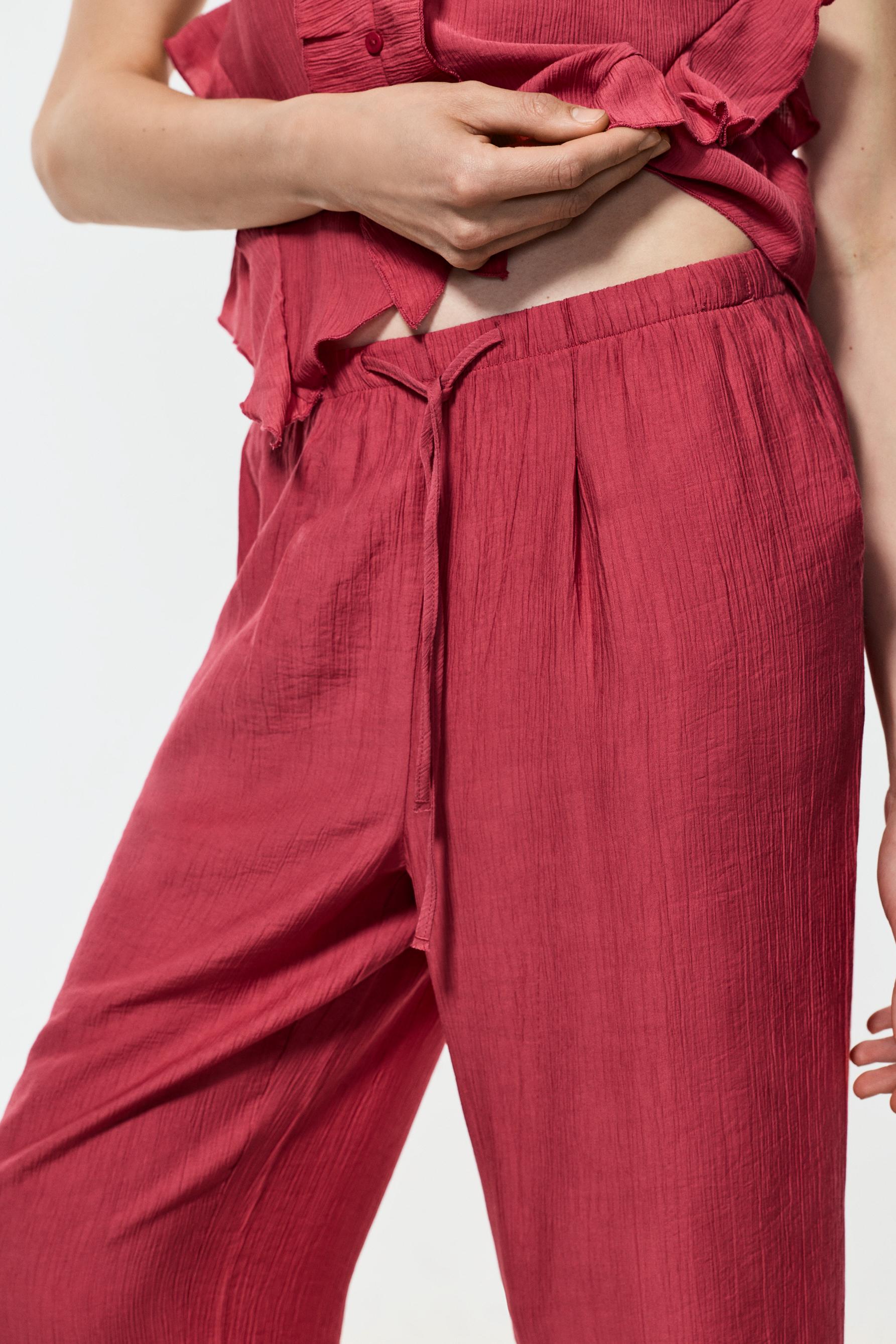 Textured jogging trousers — PALE MAROON