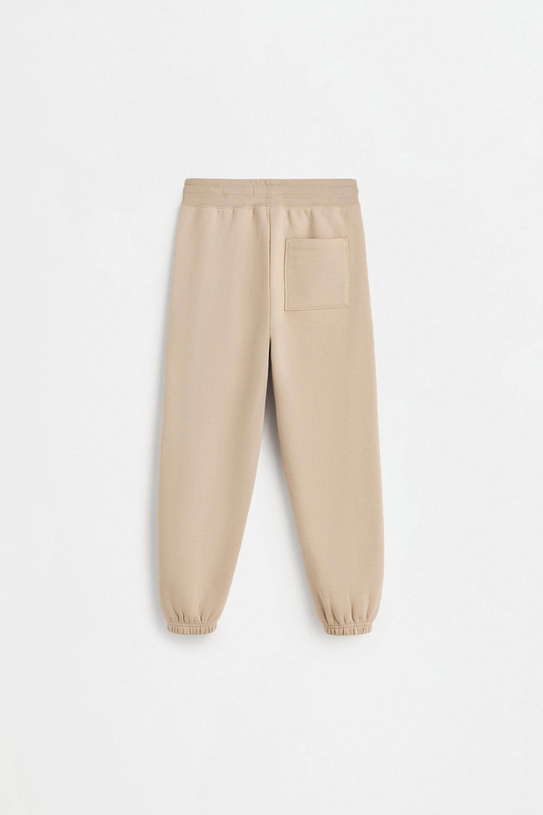 Plush trousers with knee stitching — SAND