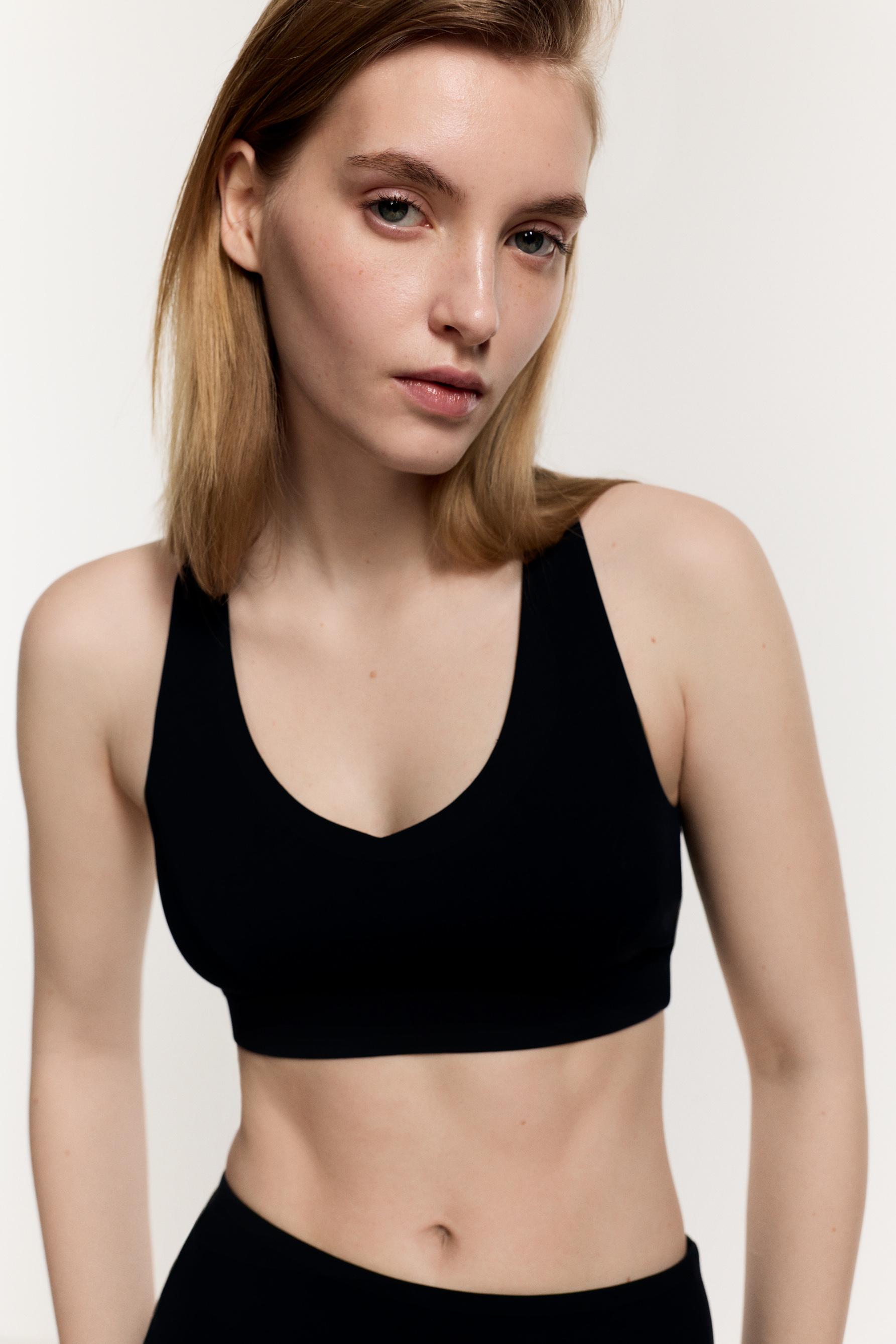 Criss-cross strap sports top — BLACK