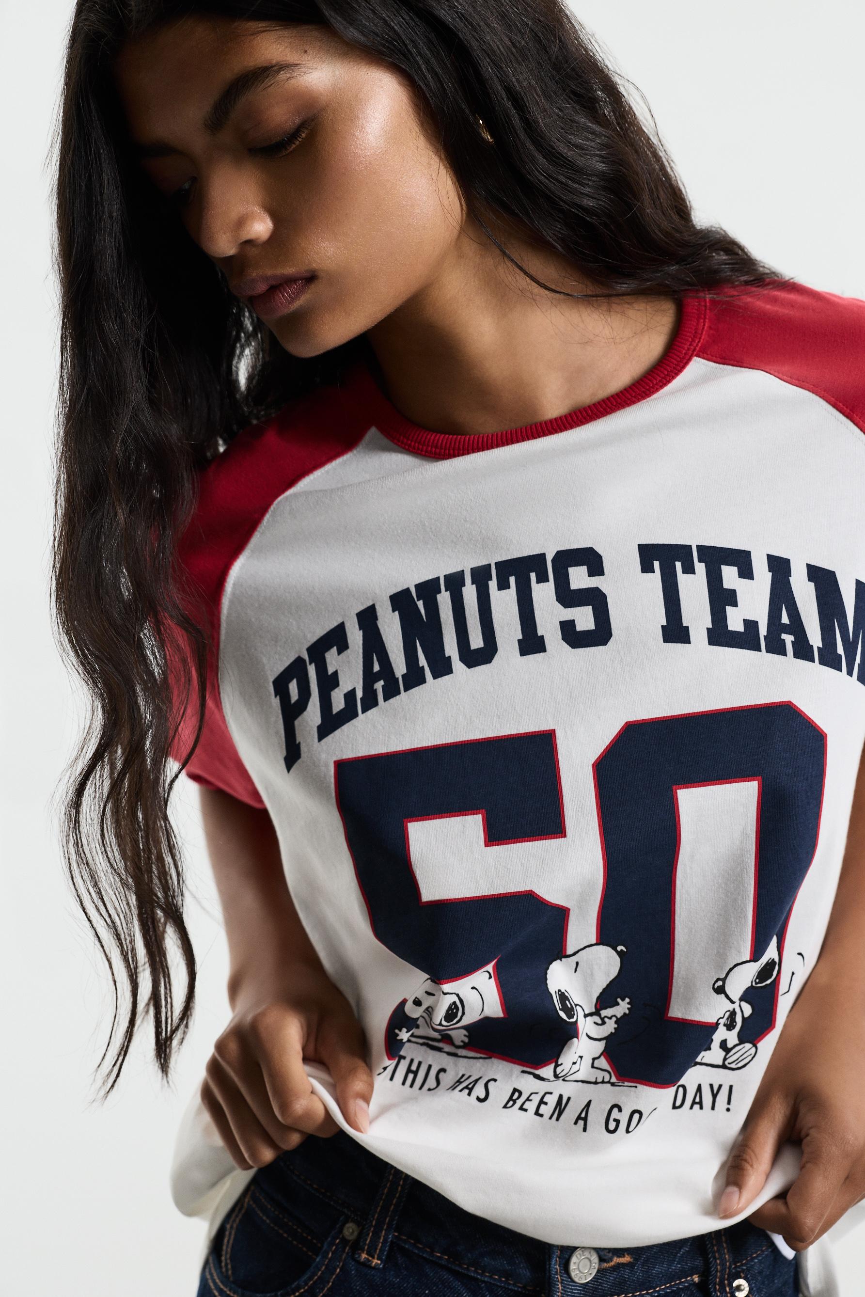 Snoopy Peanuts™ raglan sleeve T-shirt — OFF WHITE