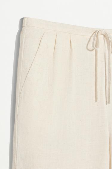Rustic wide-leg trousers — TAN 7