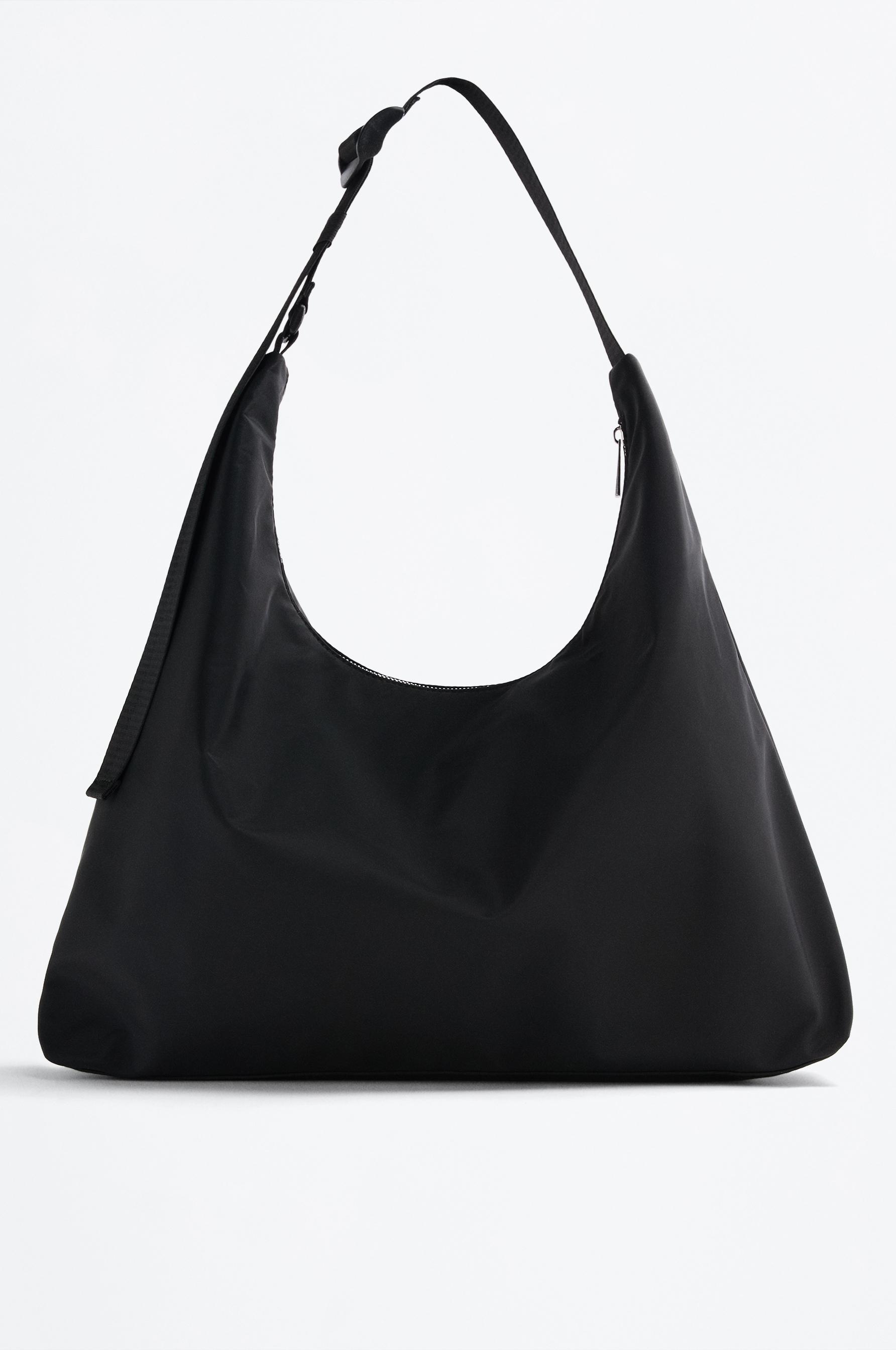 Bolso saco nailon cinturón