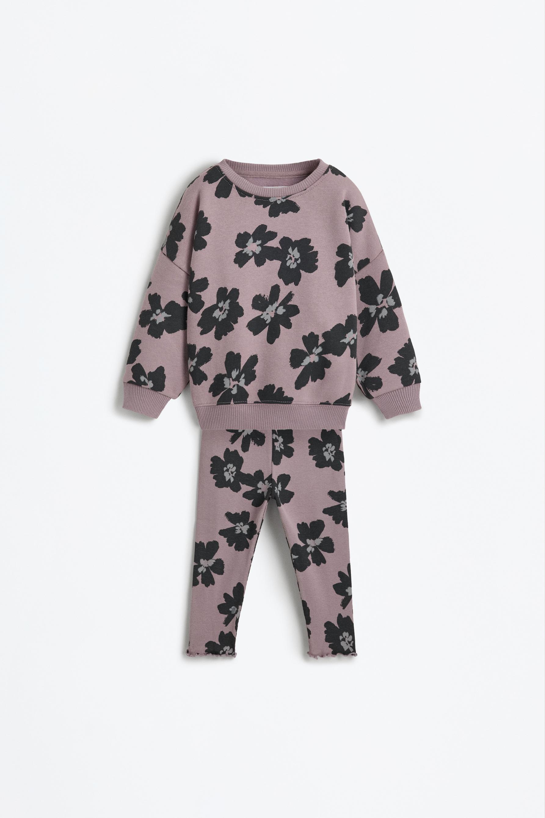 Conjunto sudadera estampada y legging canalé