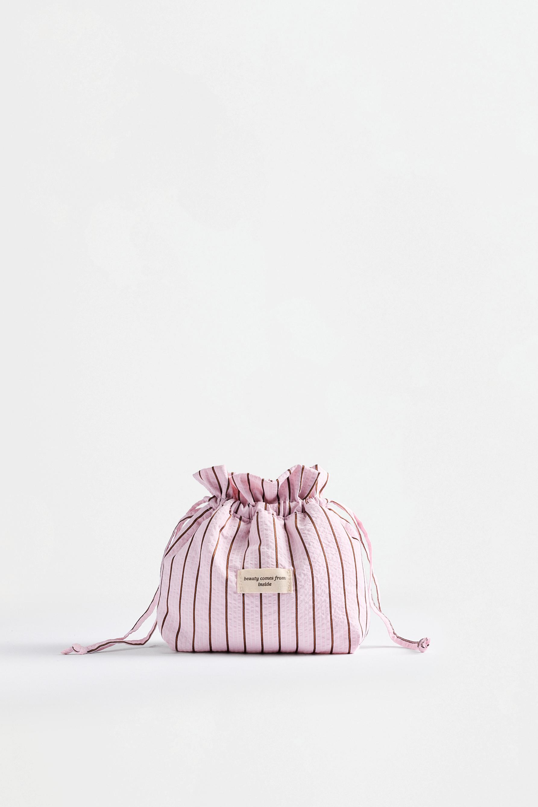 Small striped toiletry bag — ROSE PINK