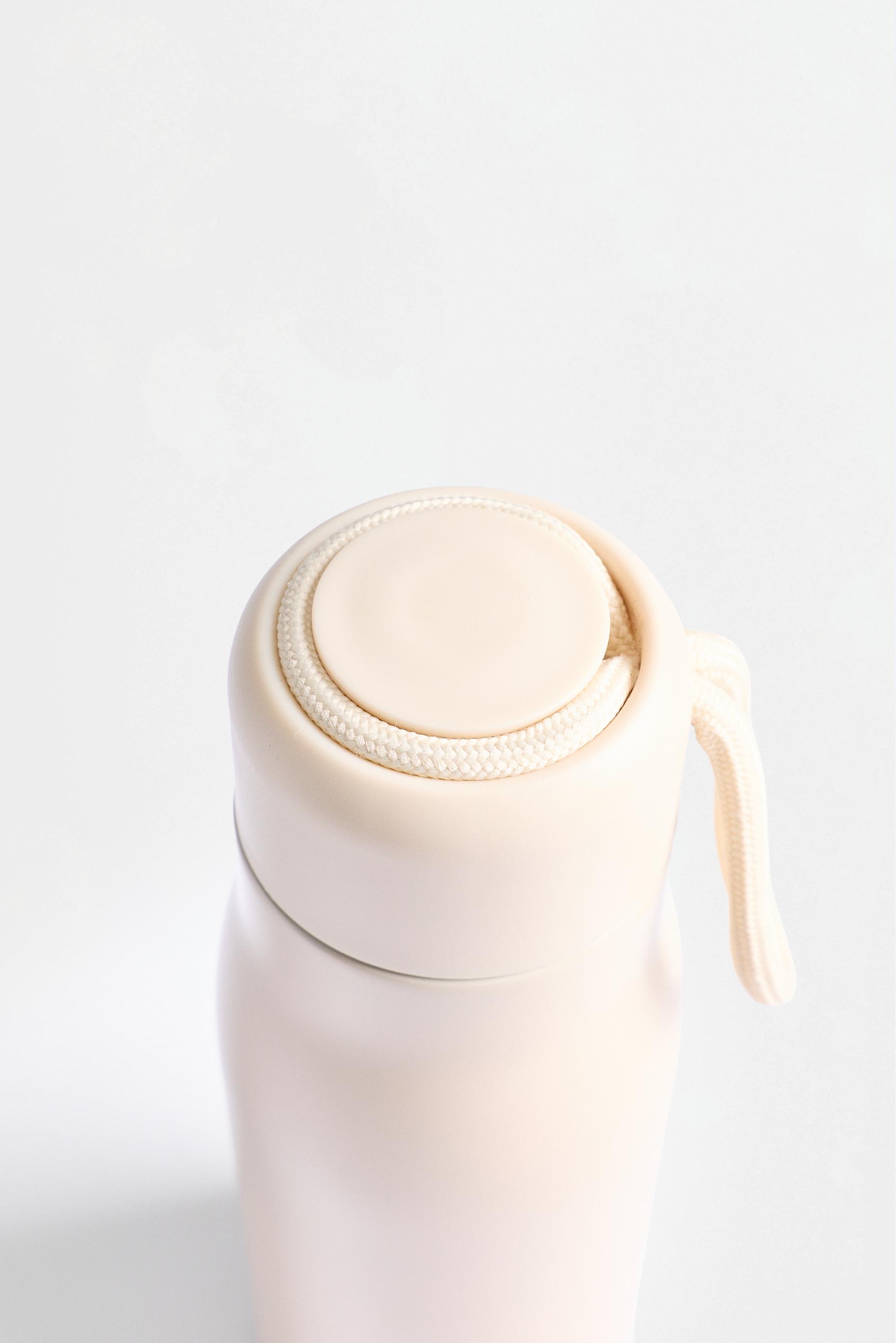 Metallic travel bottle — ECRU