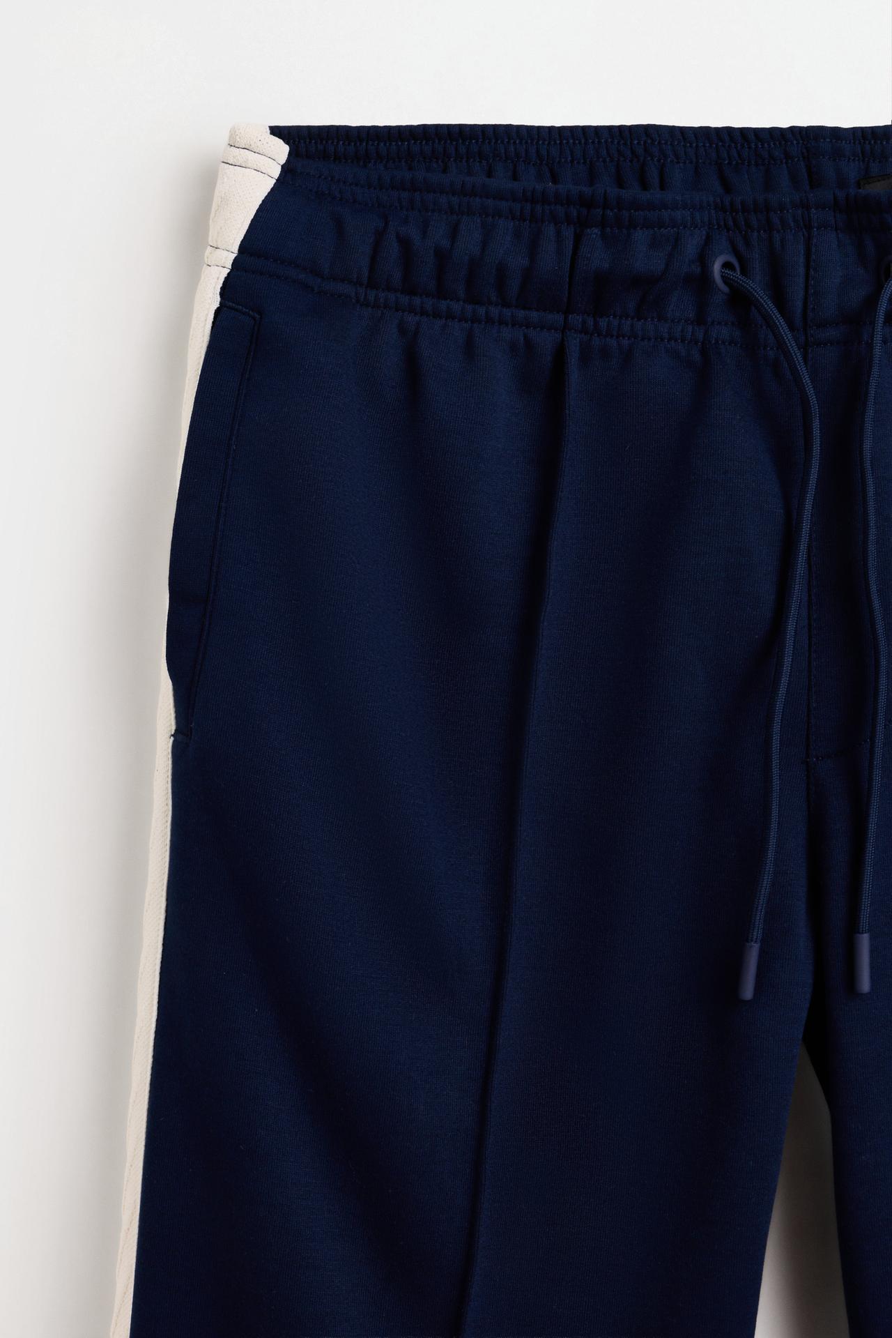 Interlock trousers with side stripes — NAVY BLUE