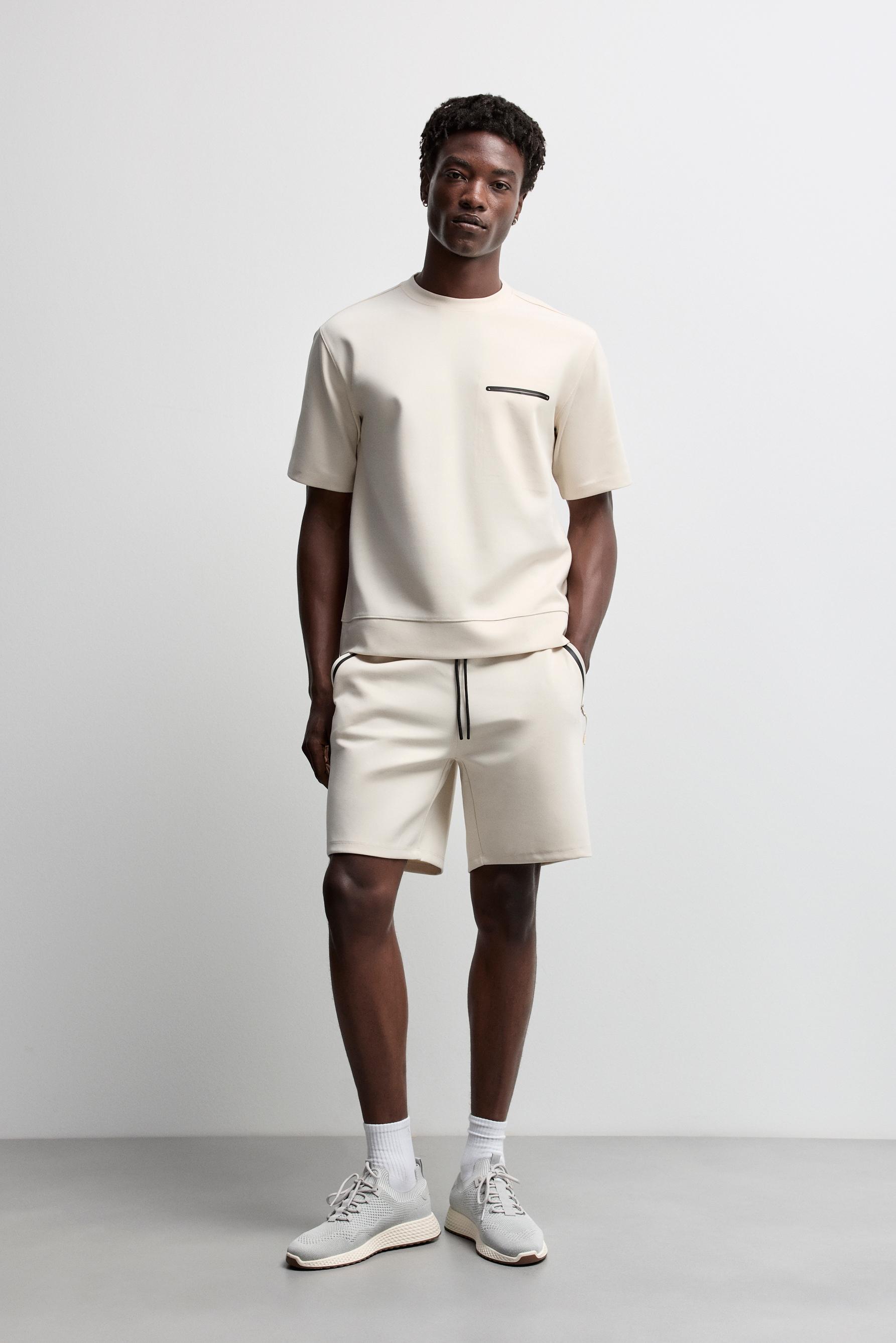 Interlock Sports T-shirt — PALE SAND