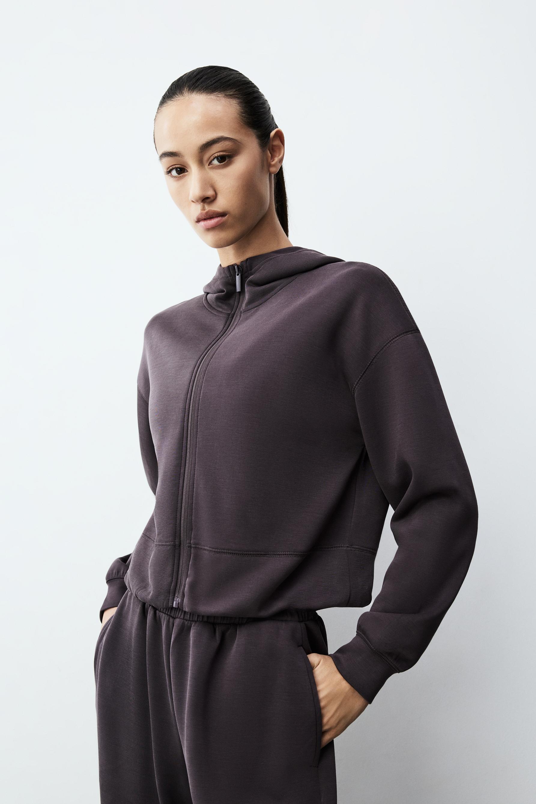 Sudadera cremallera cuello capucha