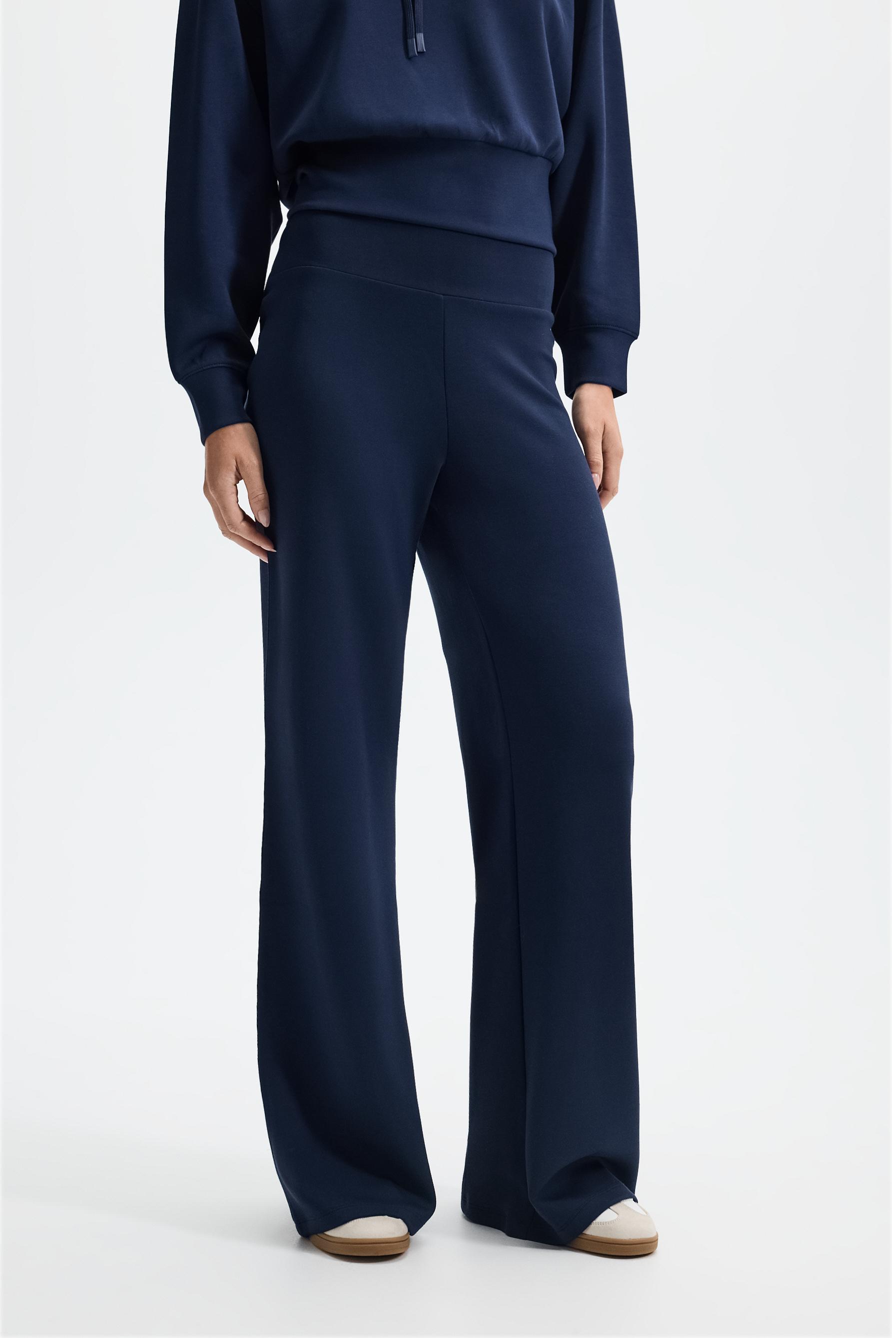 Flowing flared tracksuit trousers — DARK BLUE