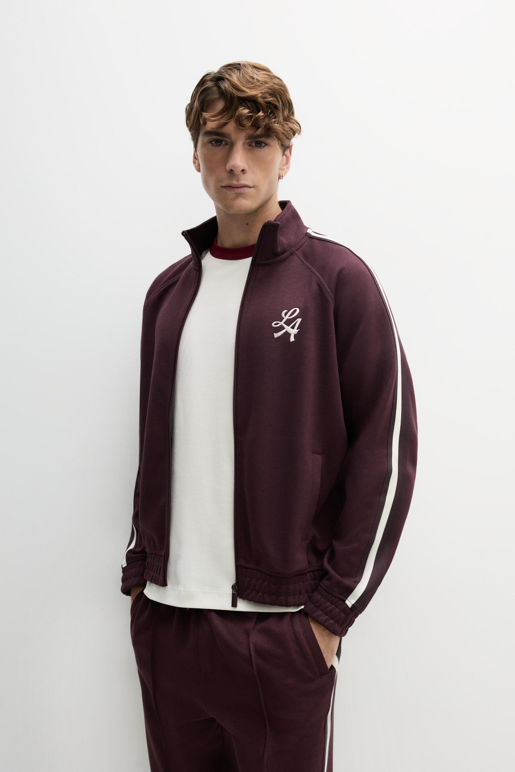 Chaqueta interlock banda