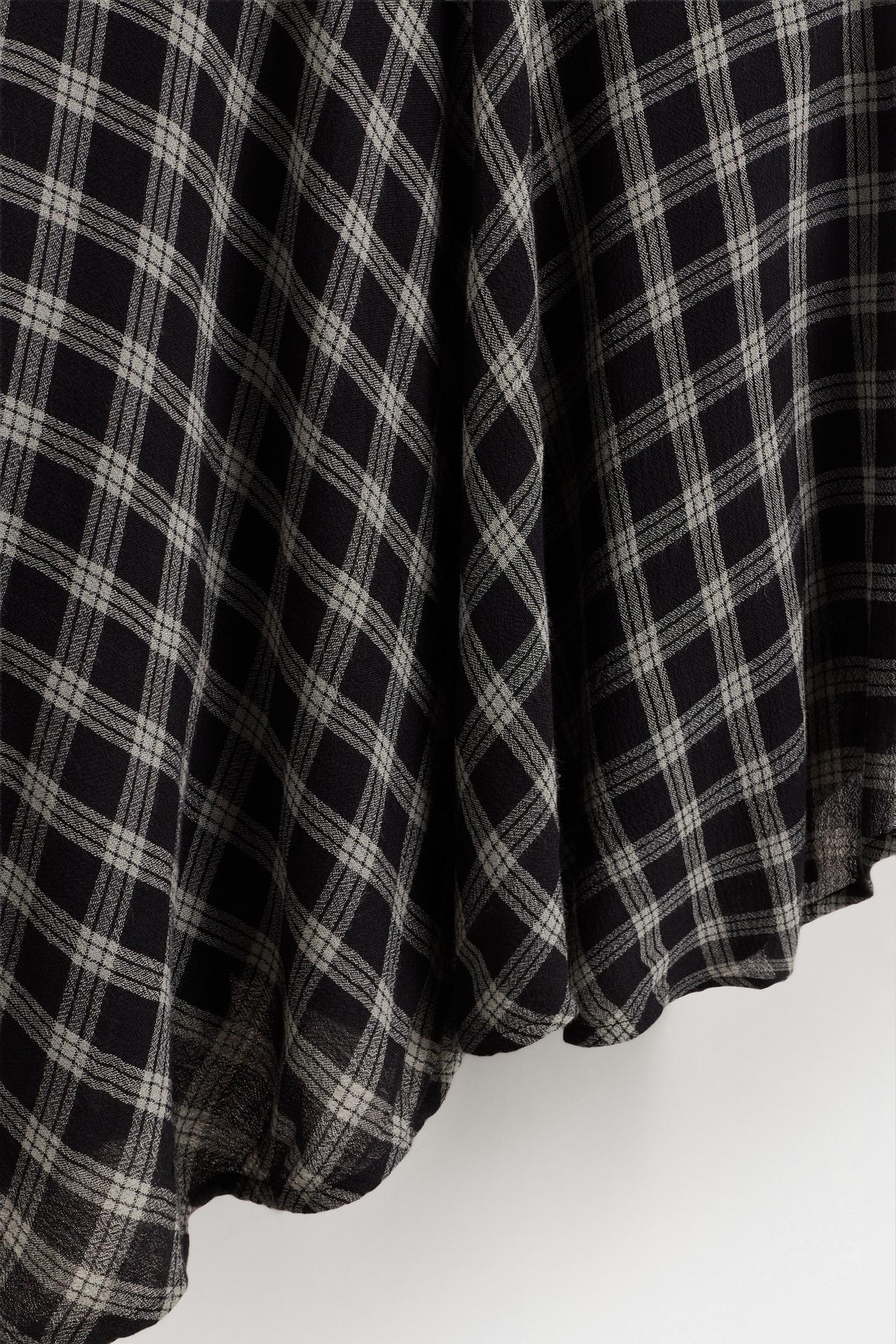 Short asymmetric plaid skirt — GREY TONES
