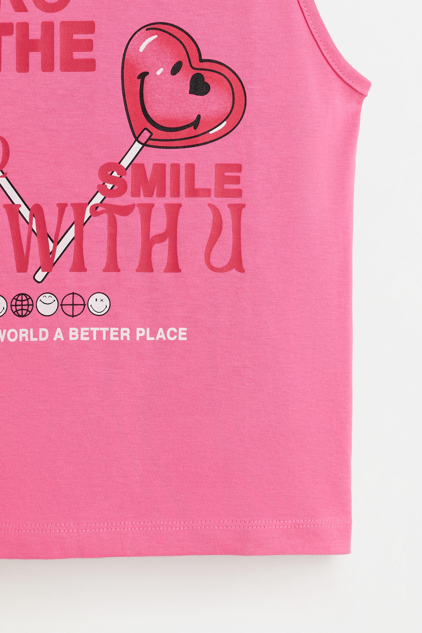 SmileyWorld® Sleeveless T-shirt — PINK