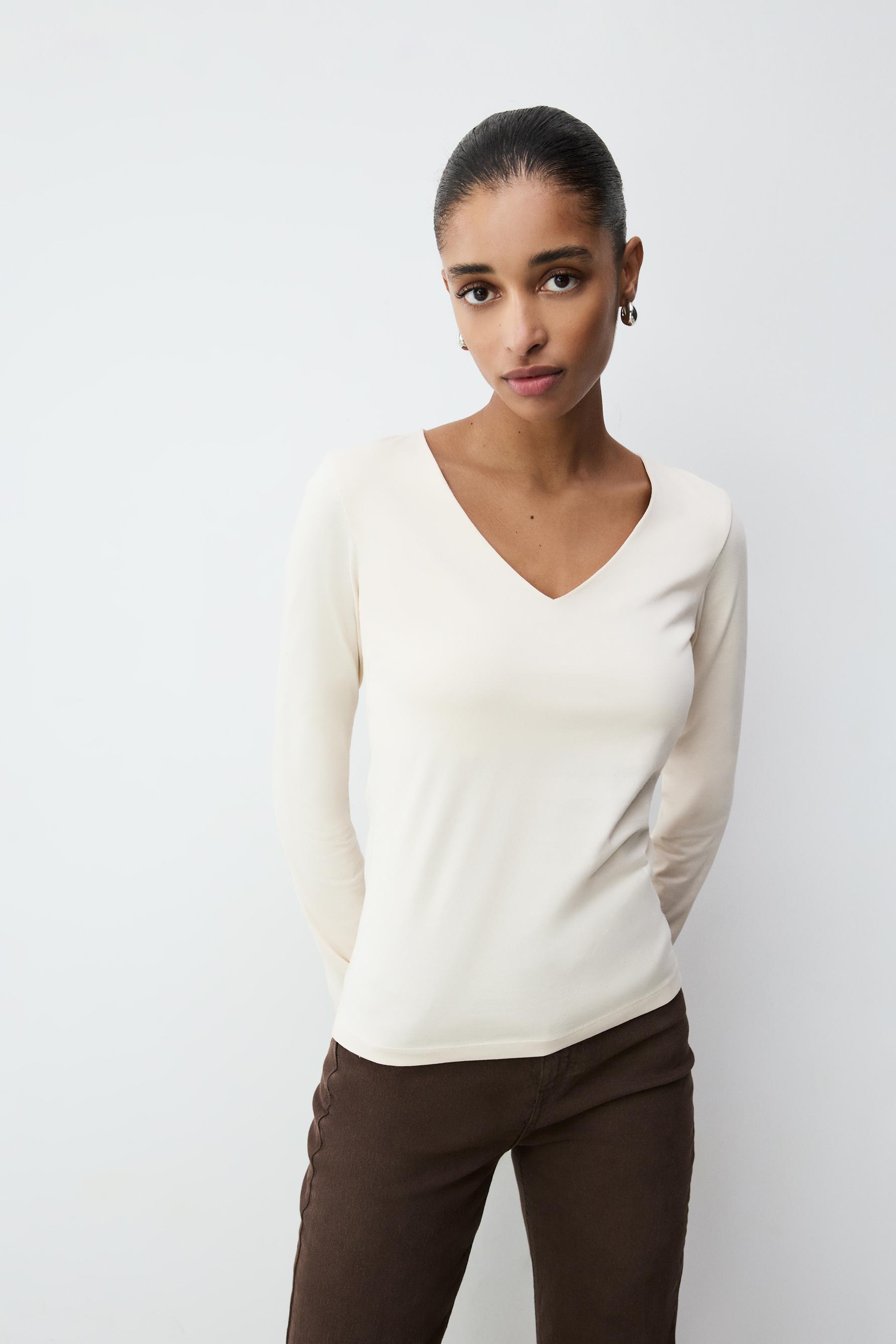 Camiseta manga larga cuello pico