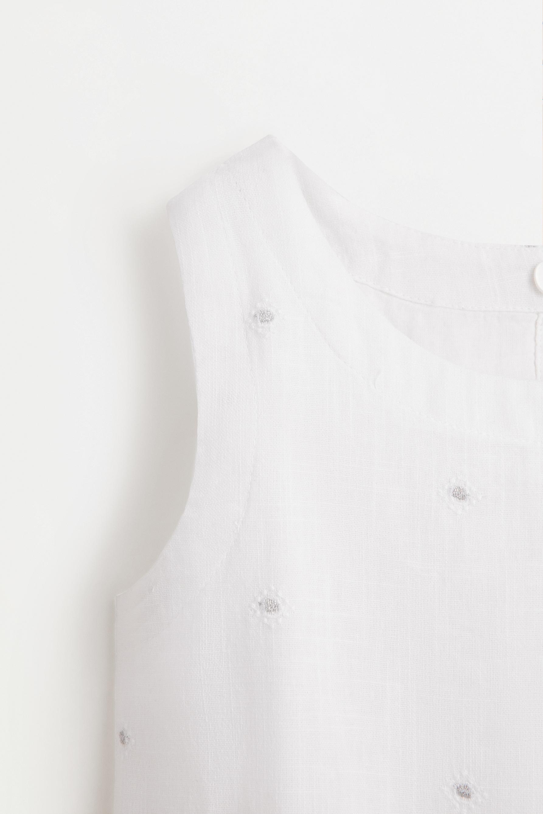 Embroidered top with shiny details — WHITE