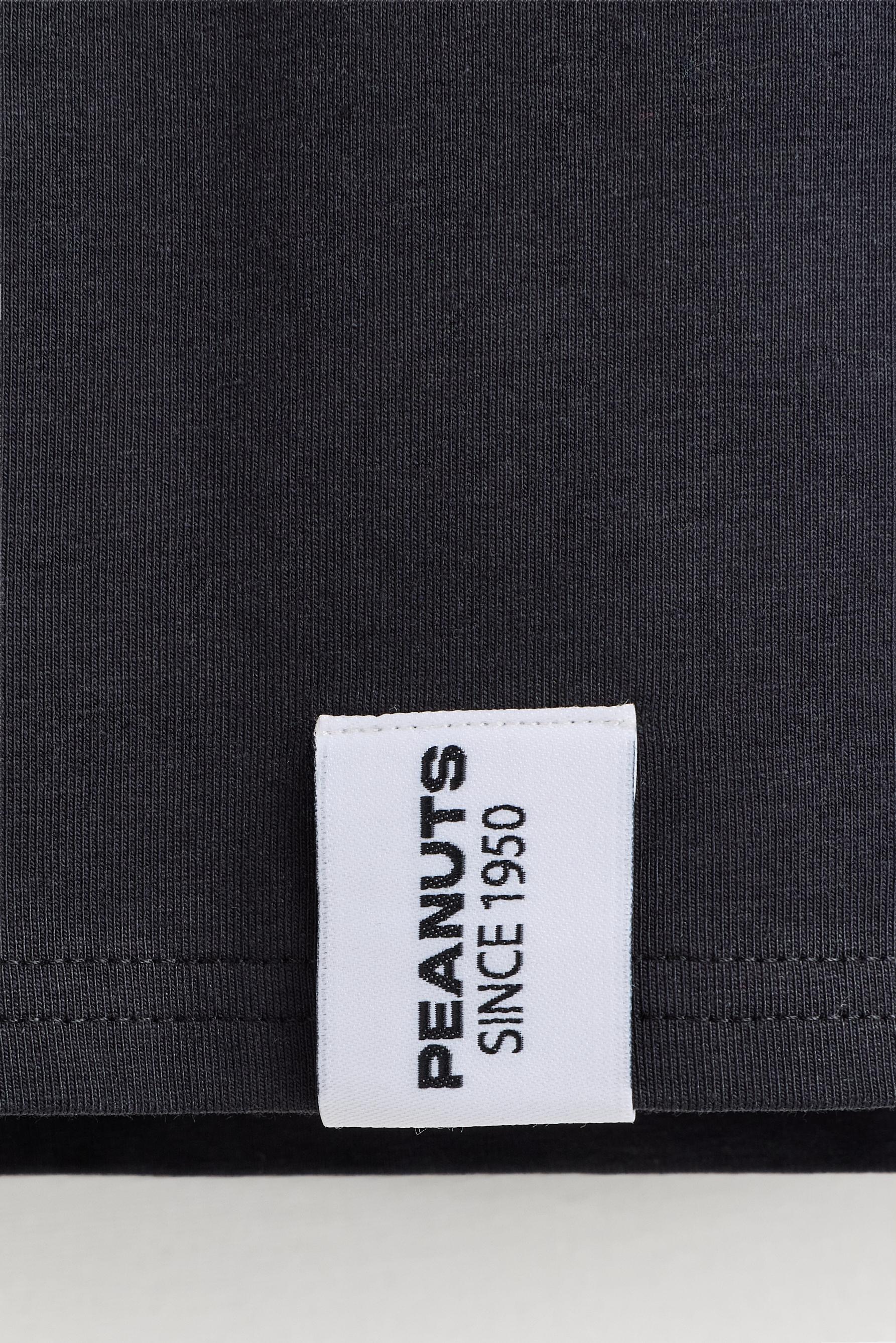 Snoopy Peanuts™ raglan sleeve T-shirt — BLACK