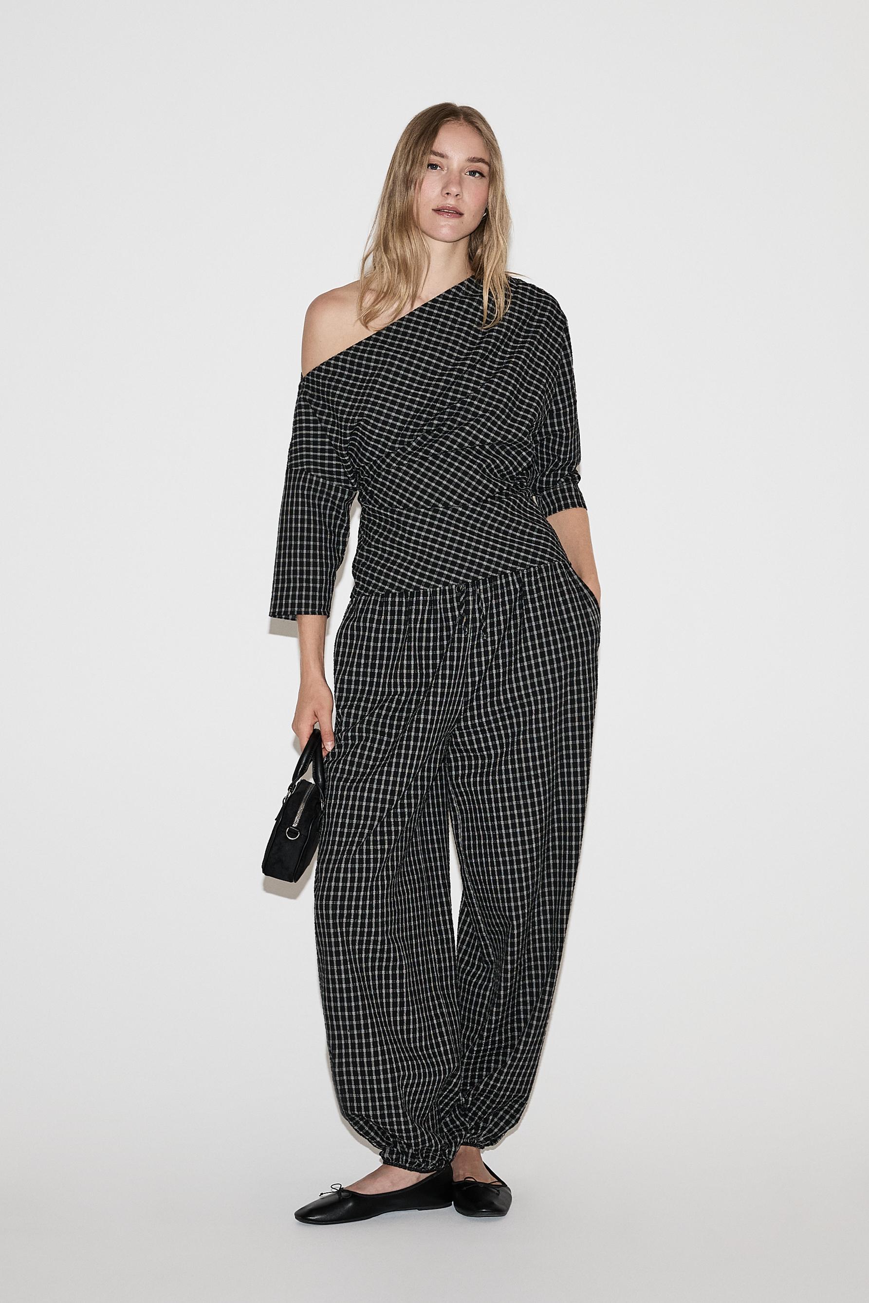 Asymmetric plaid top — BLACK