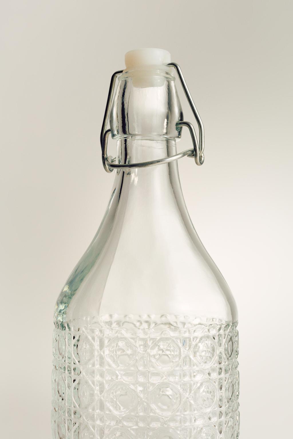 Embossed glass bottle 1000 ml