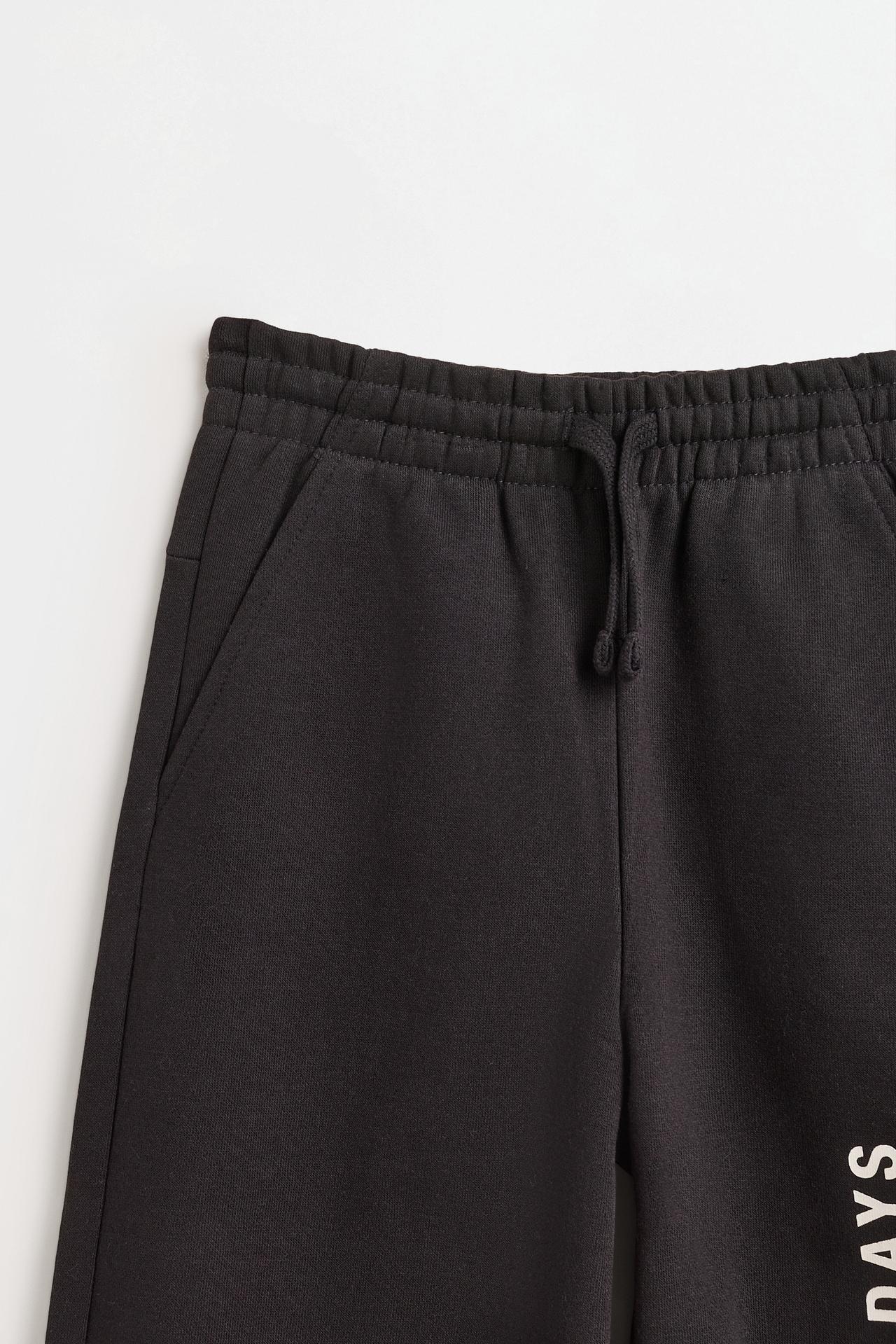 Balloon trousers with text — BLACK